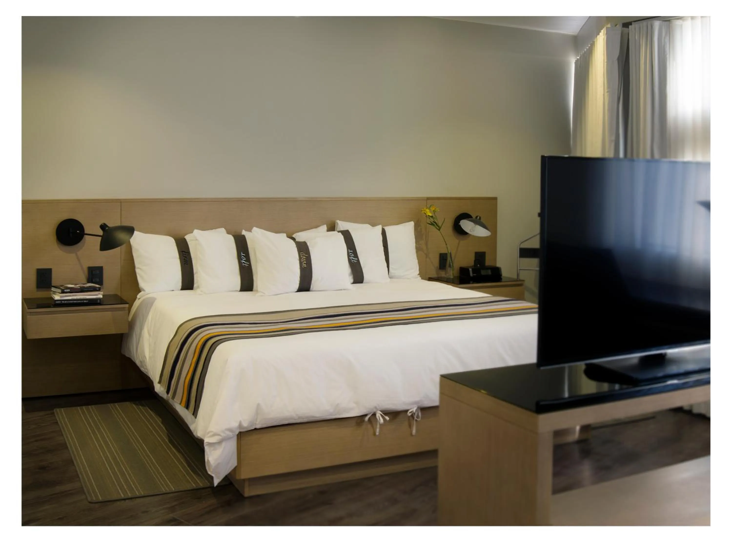 Bed in Casa Grande Suites