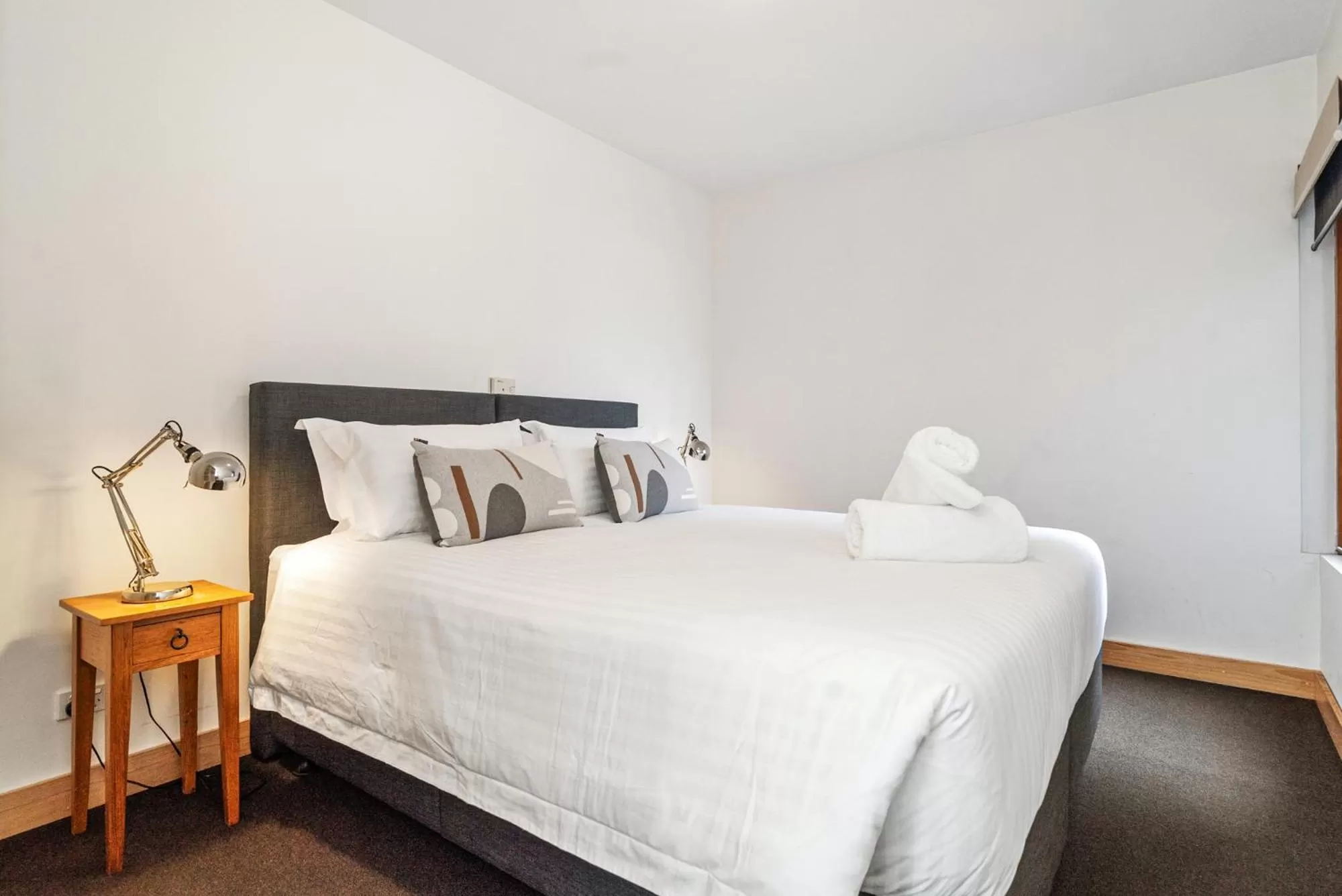 Bedroom in Alpine Woodsmoke Apartments