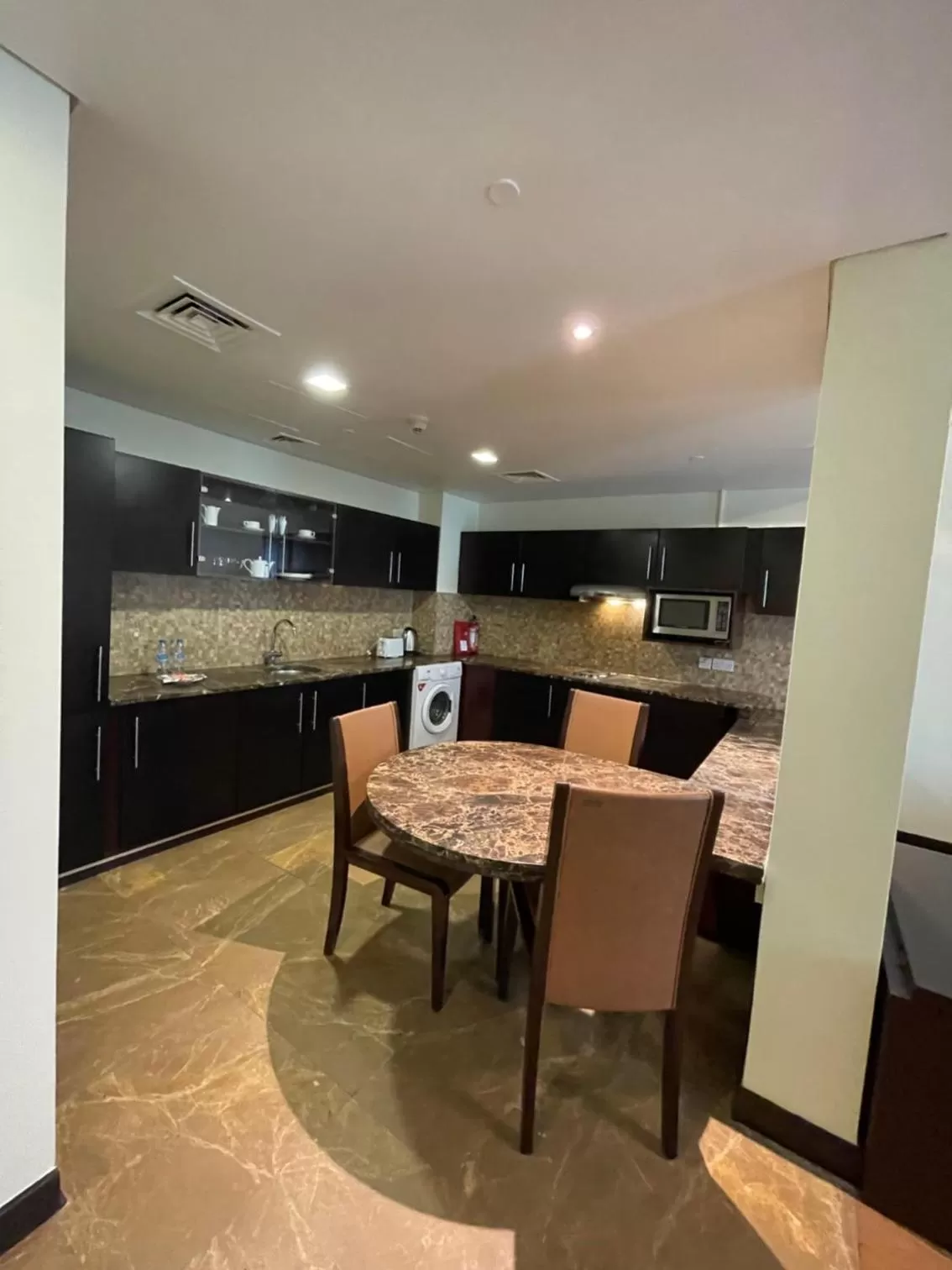 Kitchen or kitchenette in Tulip Creek Hotel Apartments