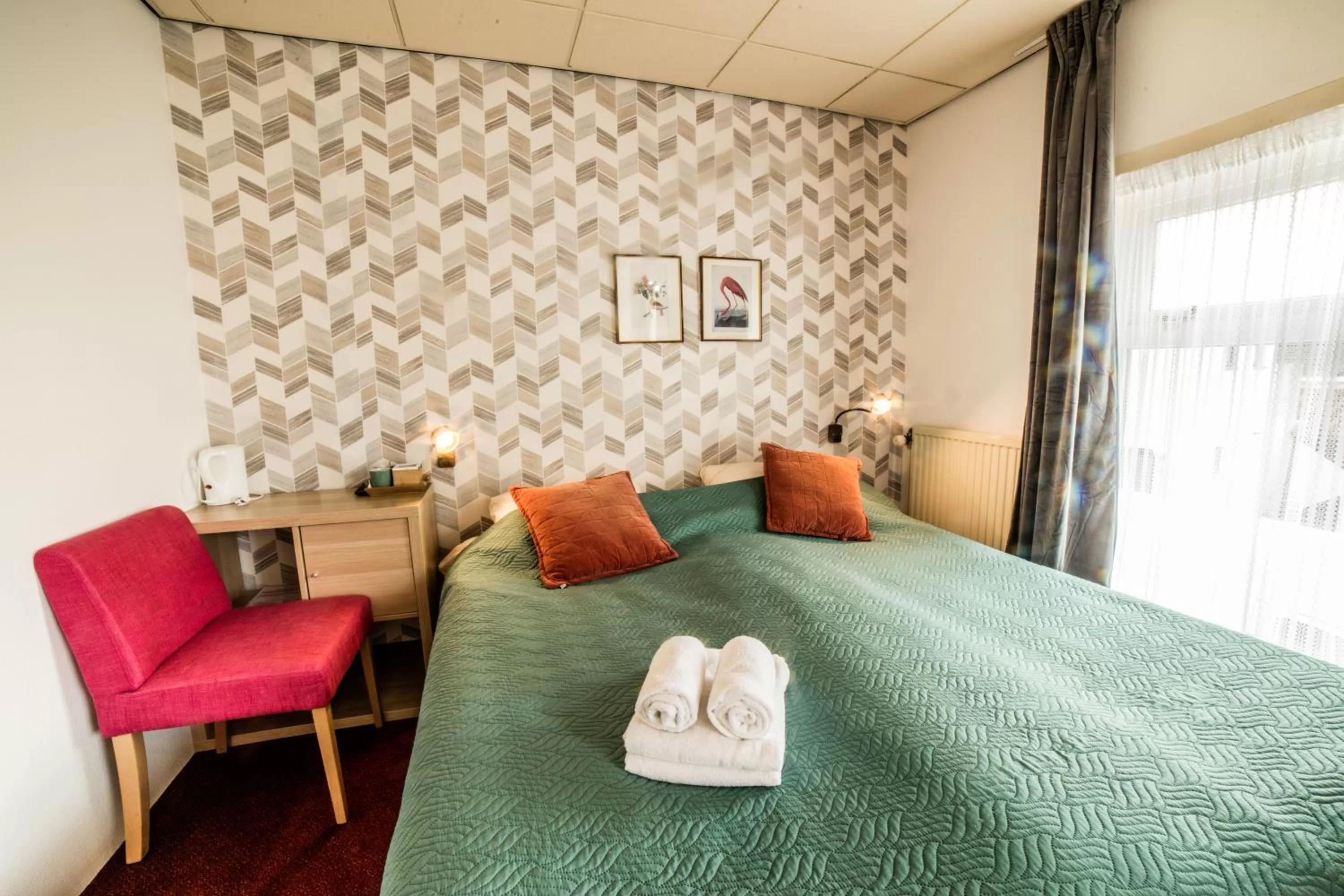 Bed in Hotel Le Provencal