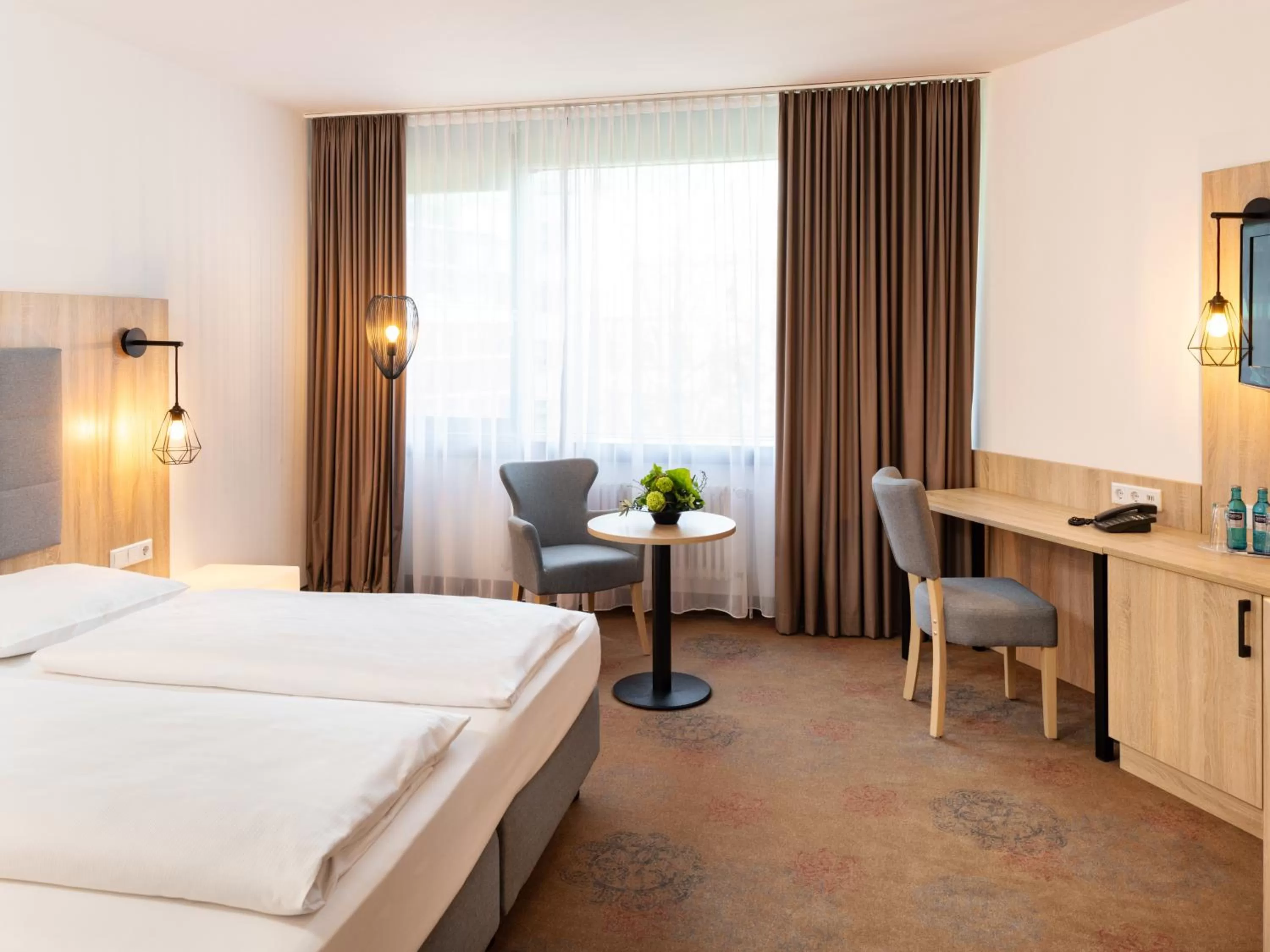 Bed in Plaza Hotel & Living Frankfurt
