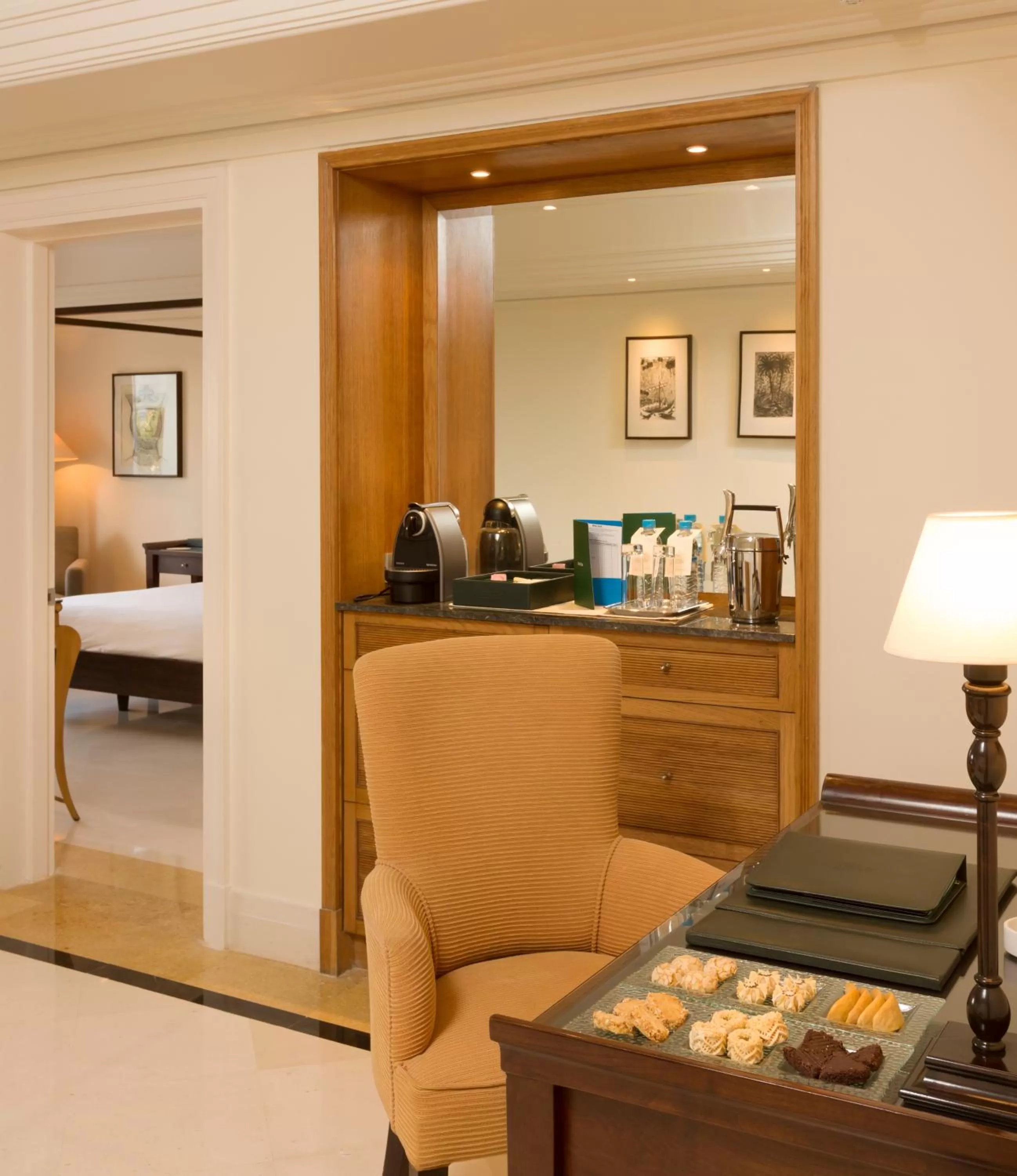 Seating area, Bed in L' Amphitrite Palace Beach Resort & Spa