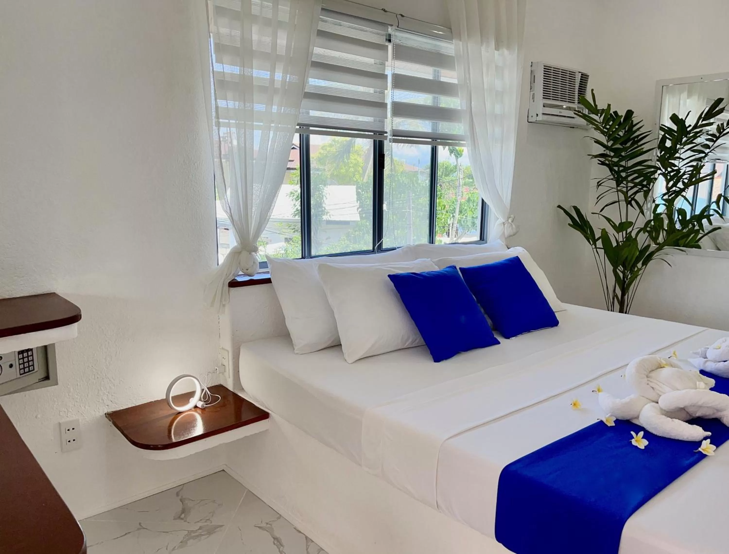 Bed in Pawikan Boutique Hotel