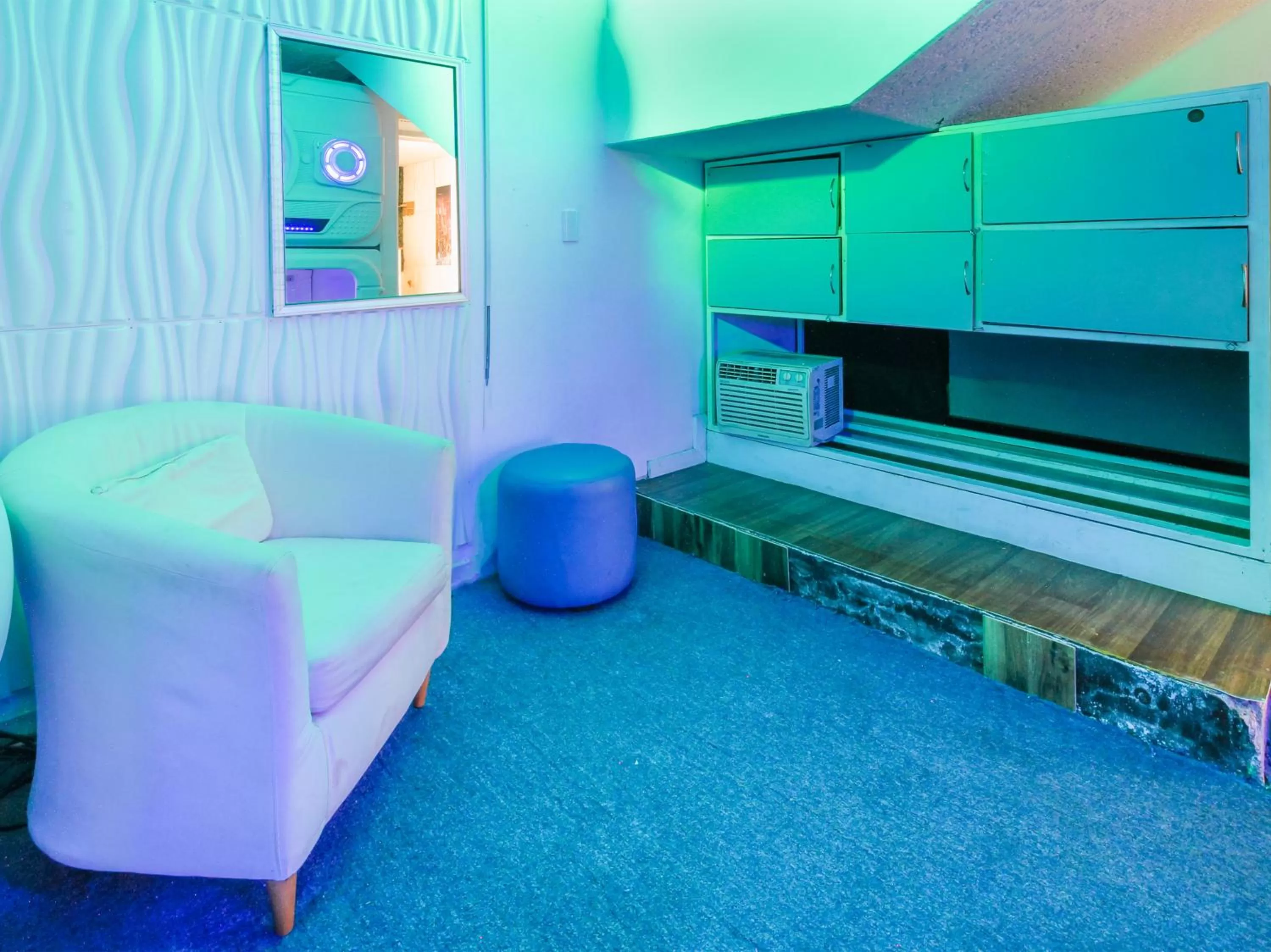 Seating area in OYO Hotel Will Capsule,Expo Guadalajara