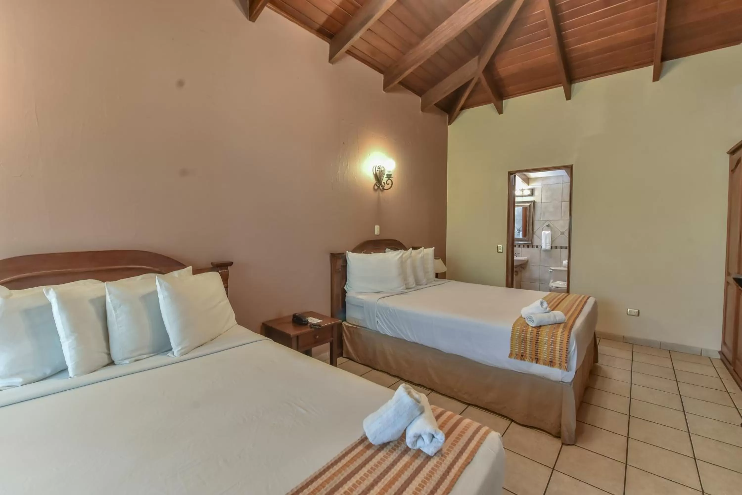 Photo of the whole room, Bed in La Riviera Hotel