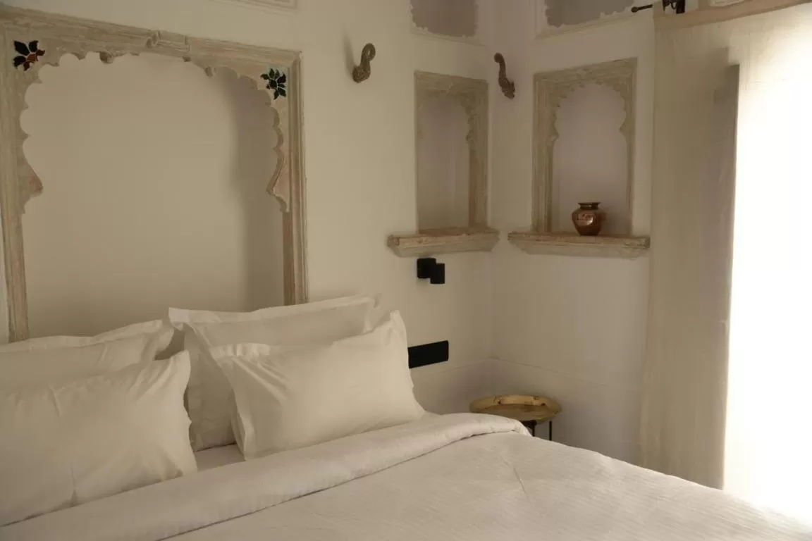 Bed in Little Garden Guest House