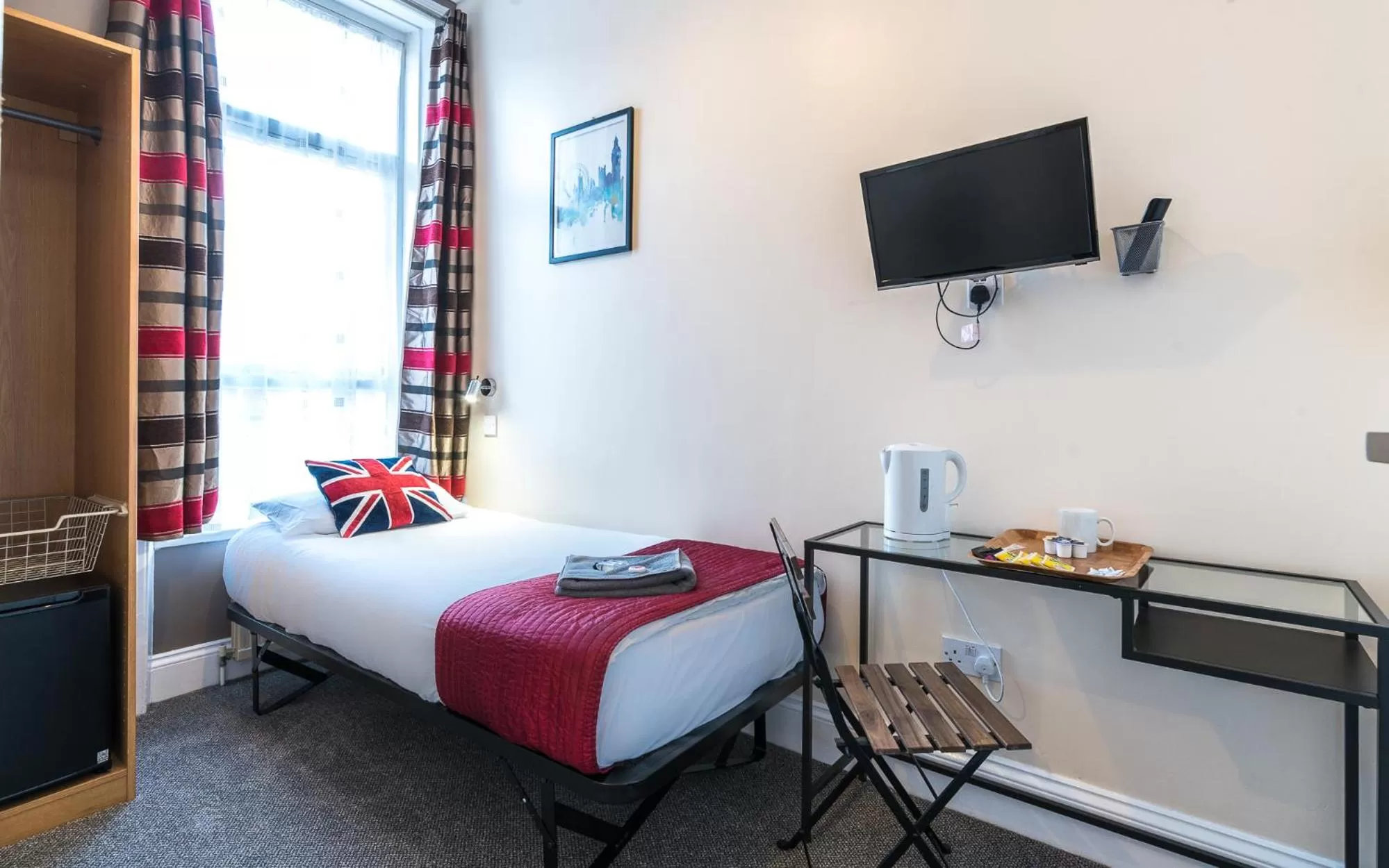 Bed in Hellenic Hotel by Saba