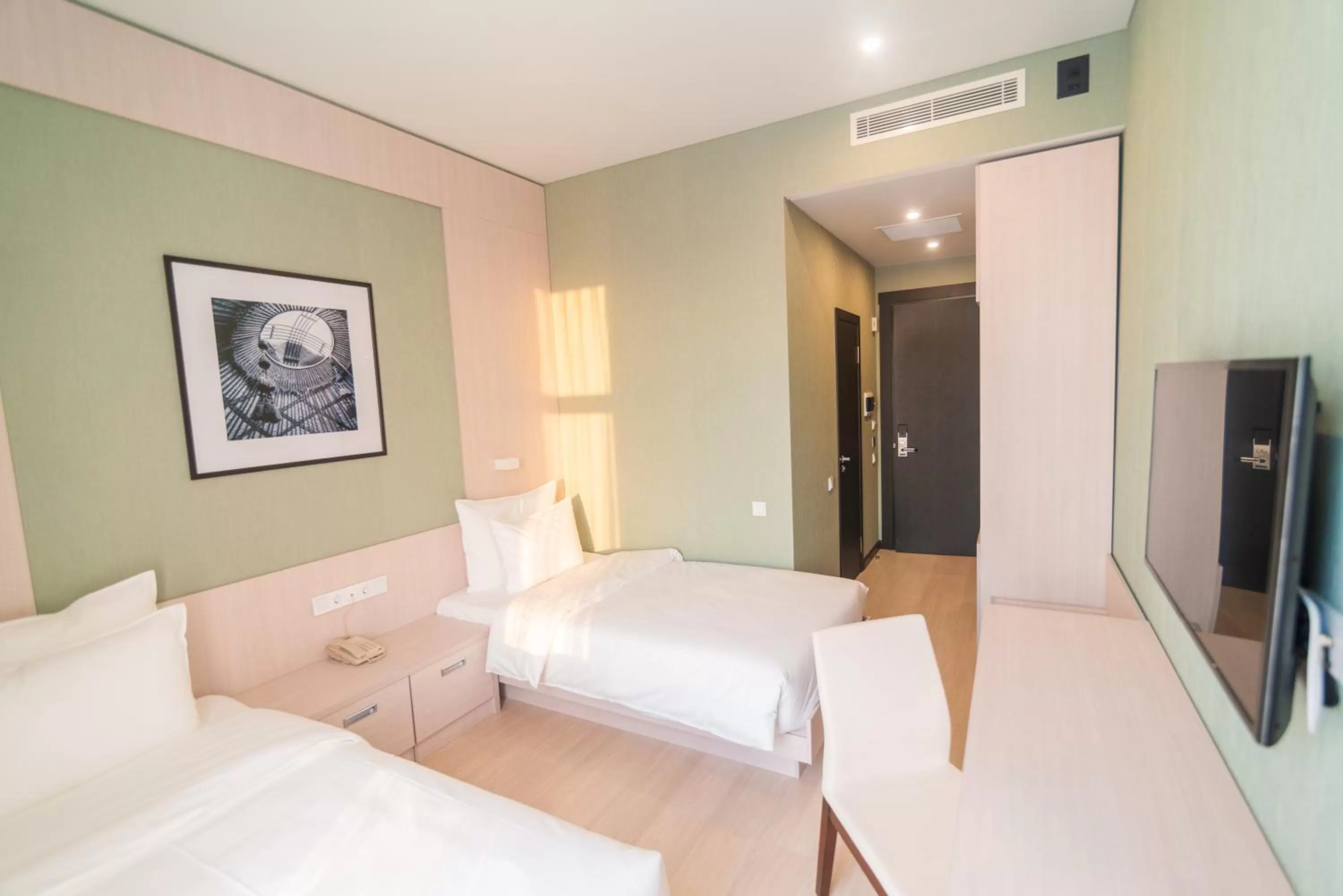 Photo of the whole room, Bed in Resident City Hotel