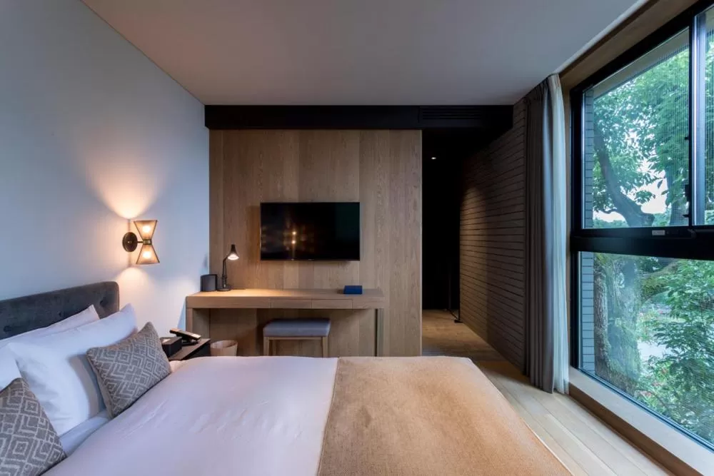 Bed in HOTEL CANATA KYOTO