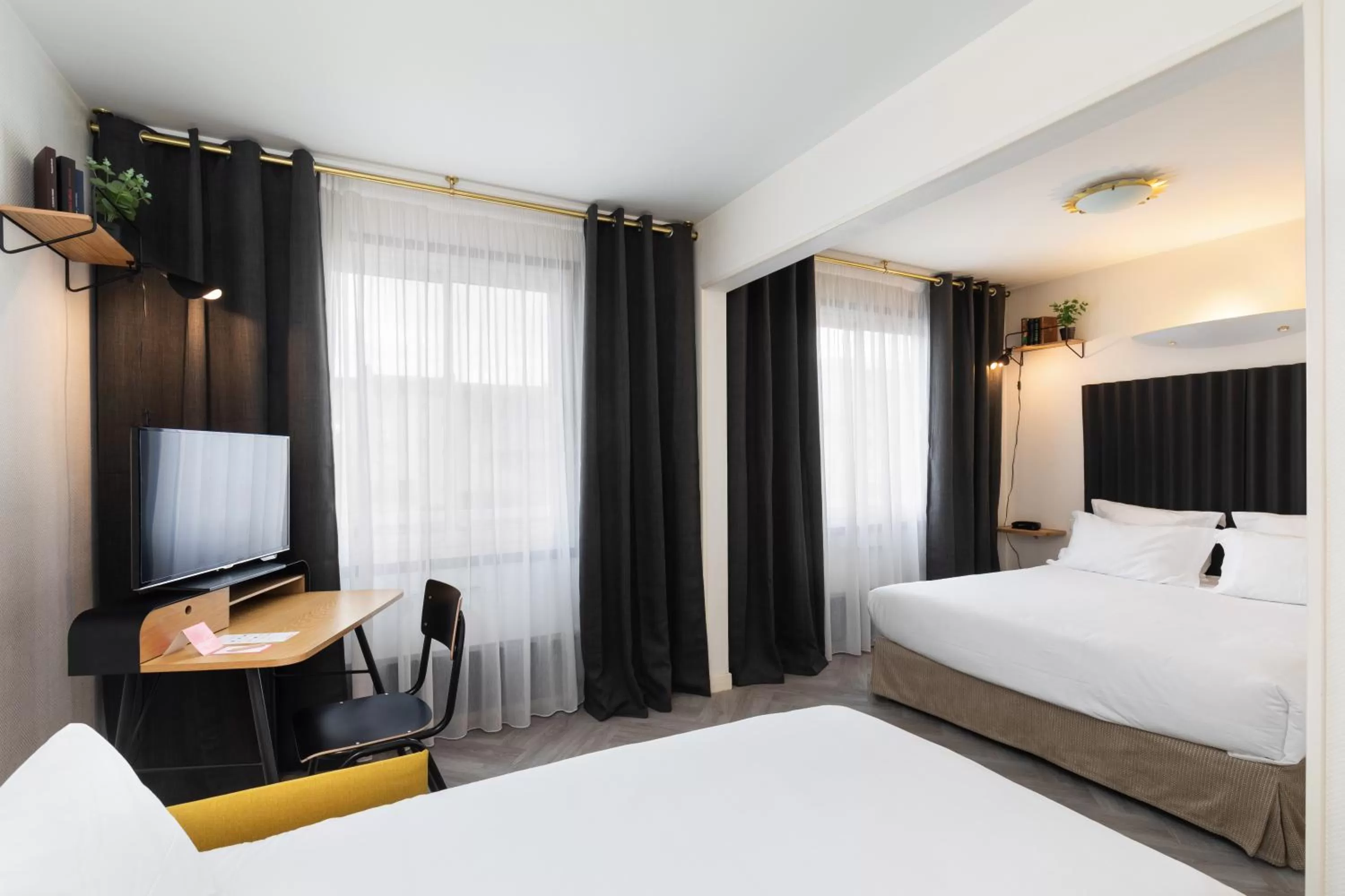 Bed in Hôtel Chromatics & Restaurant Hill Club by HappyCulture