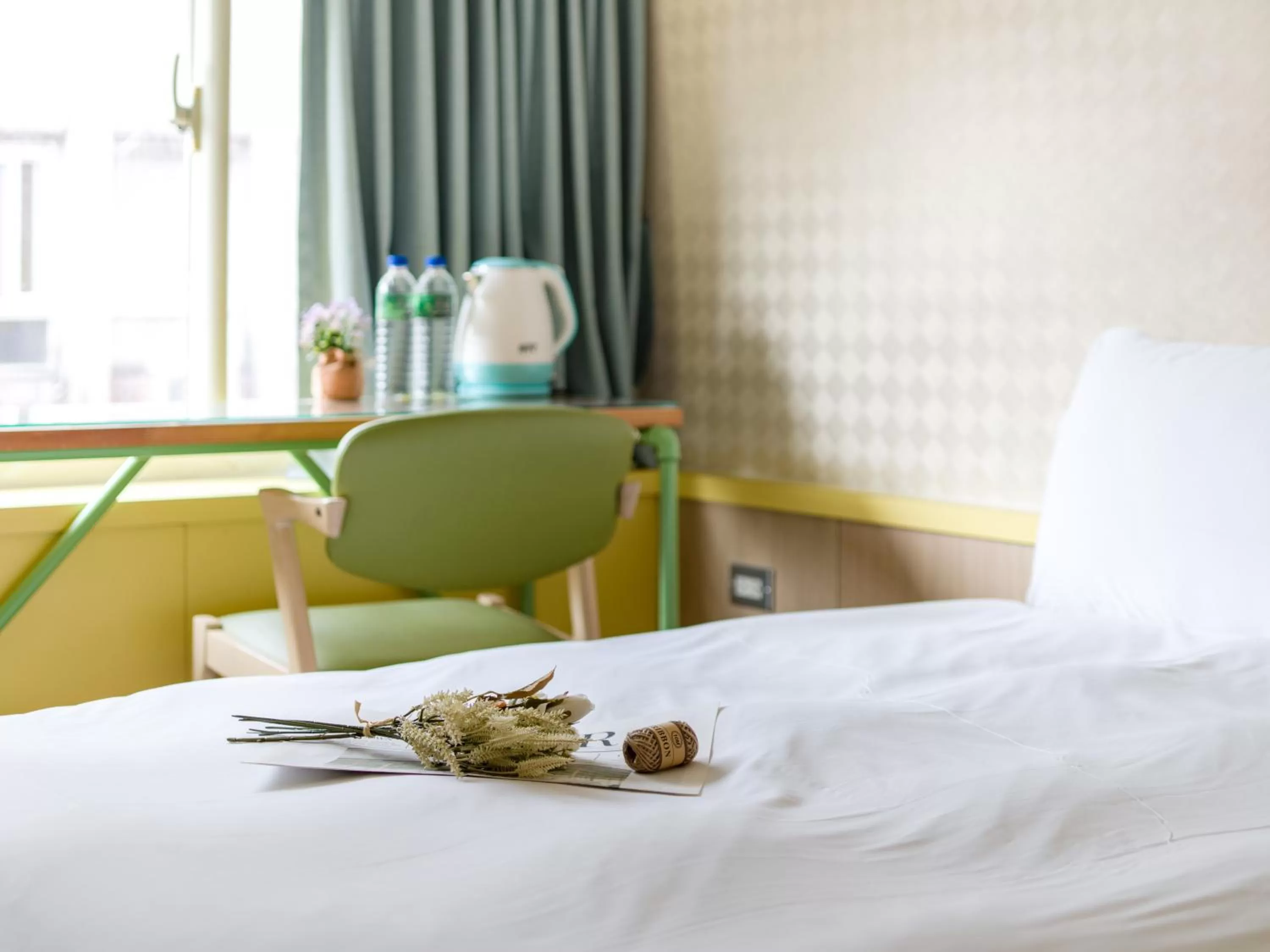 Bed in Ximenhotel-Xining西門大飯店-西寧館