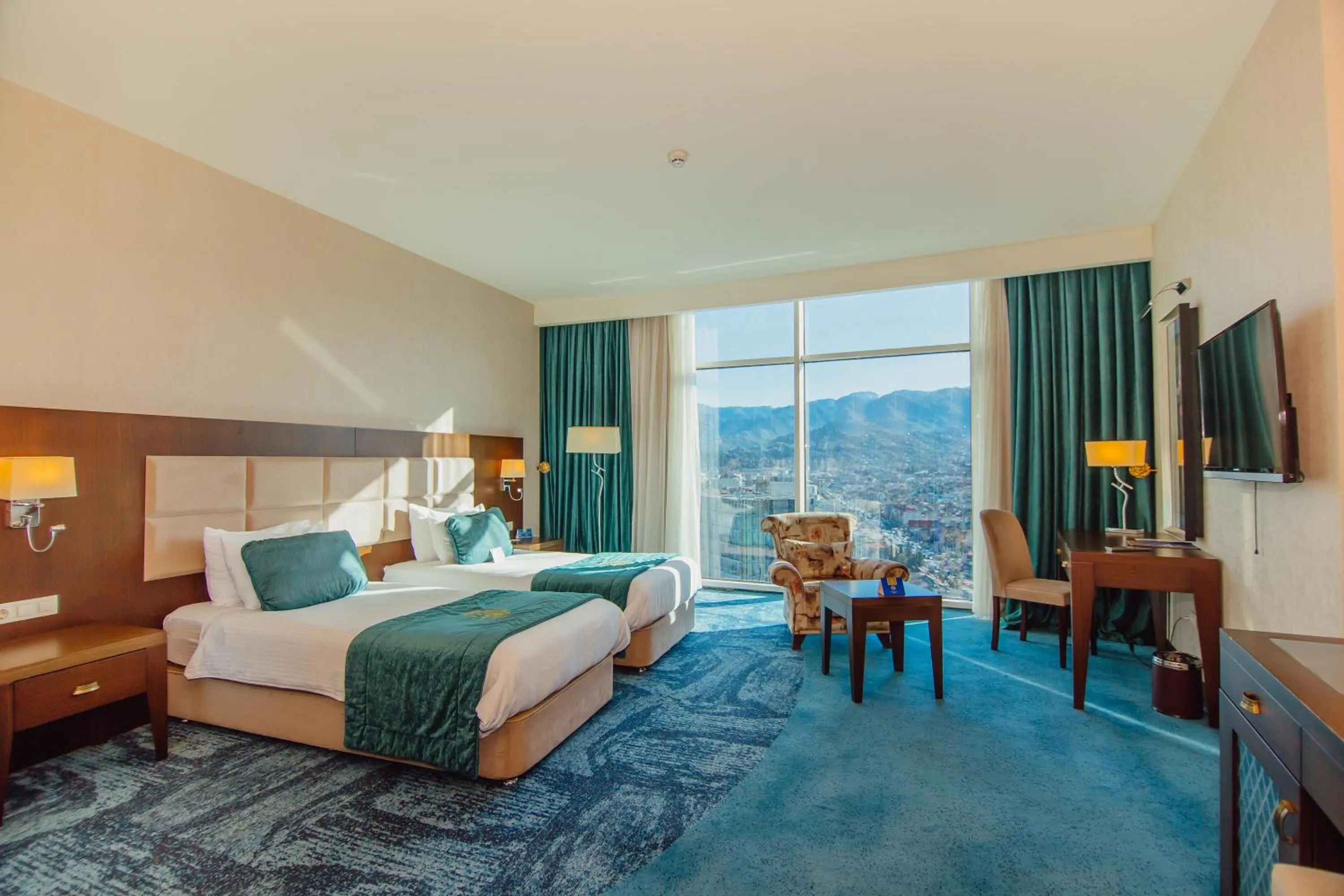 Bed in JRW Welmond Hotel