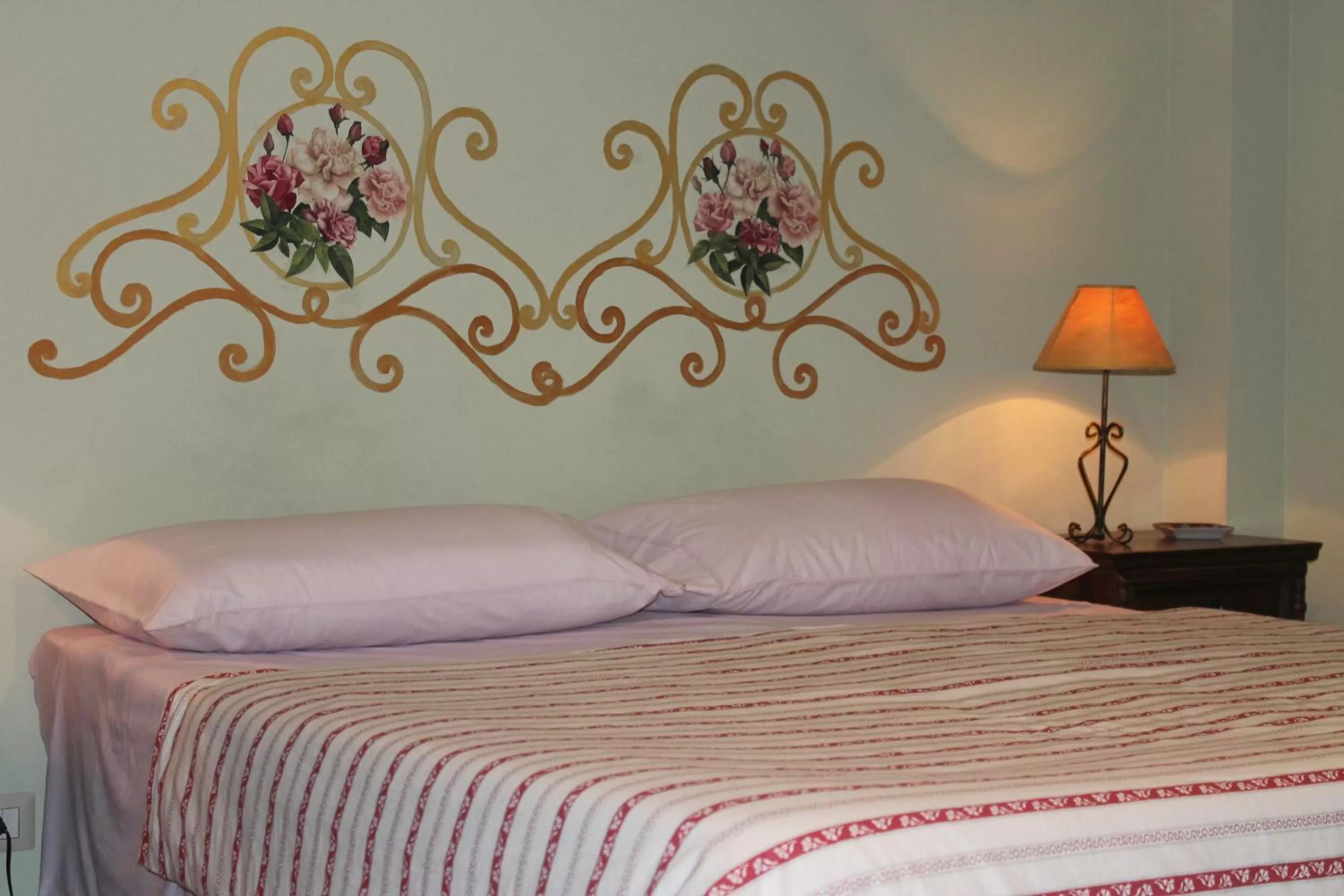Bed in B&B La Rena Rossa