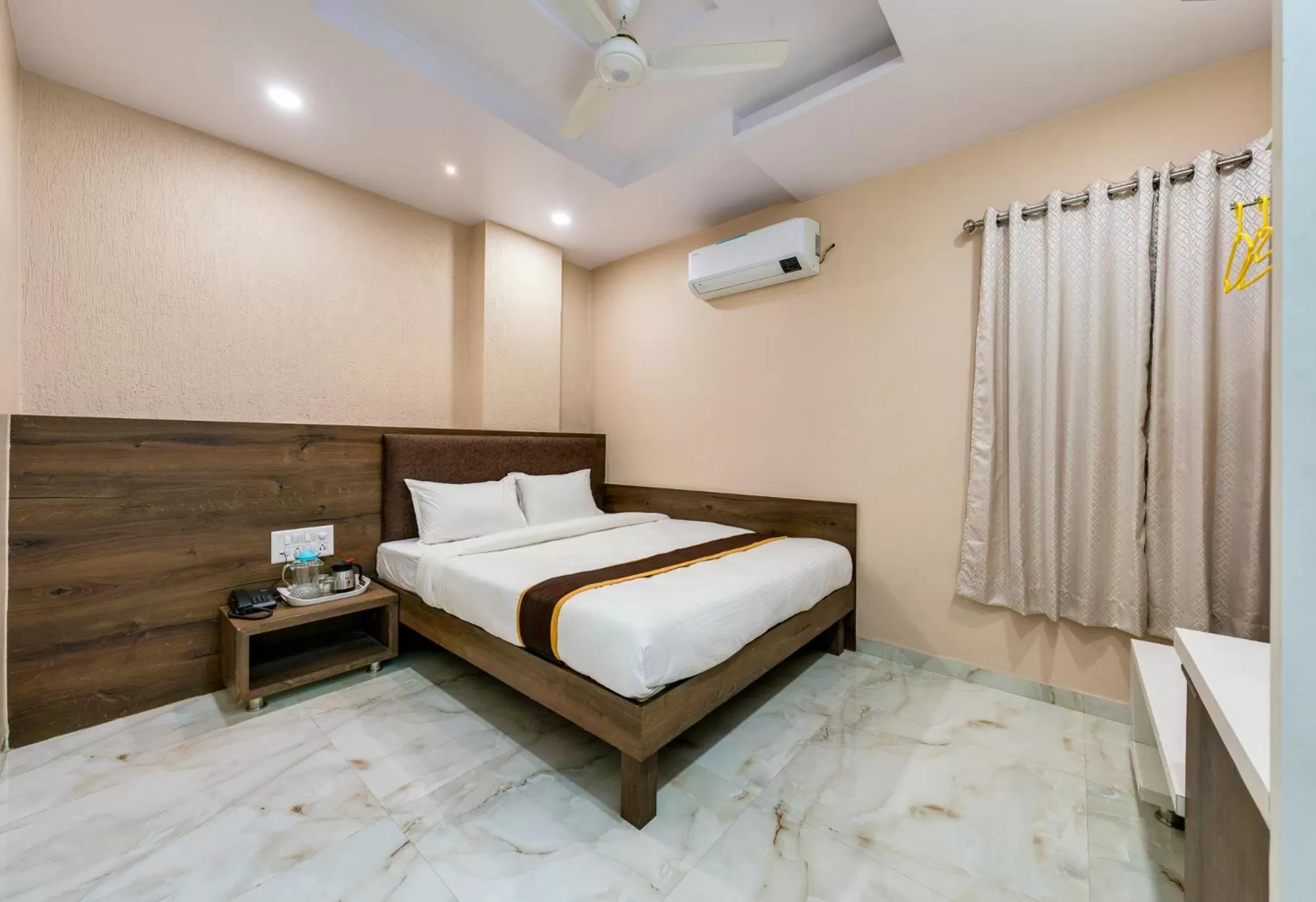 View (from property/room), Bed in Hotel Aatithya Satkar Near Mahalaxmi Temple