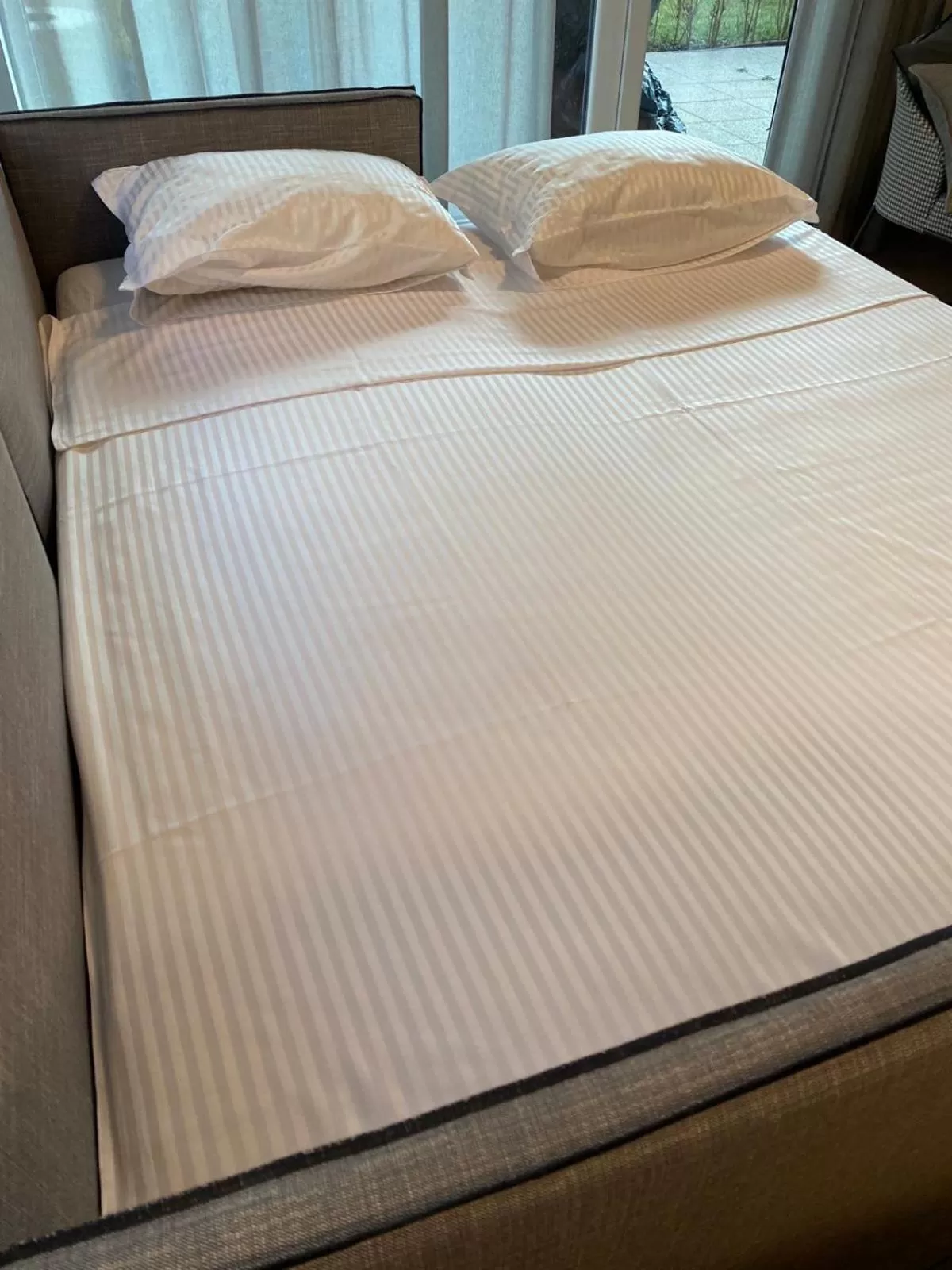 Bed in 7th Sense boutique apartments