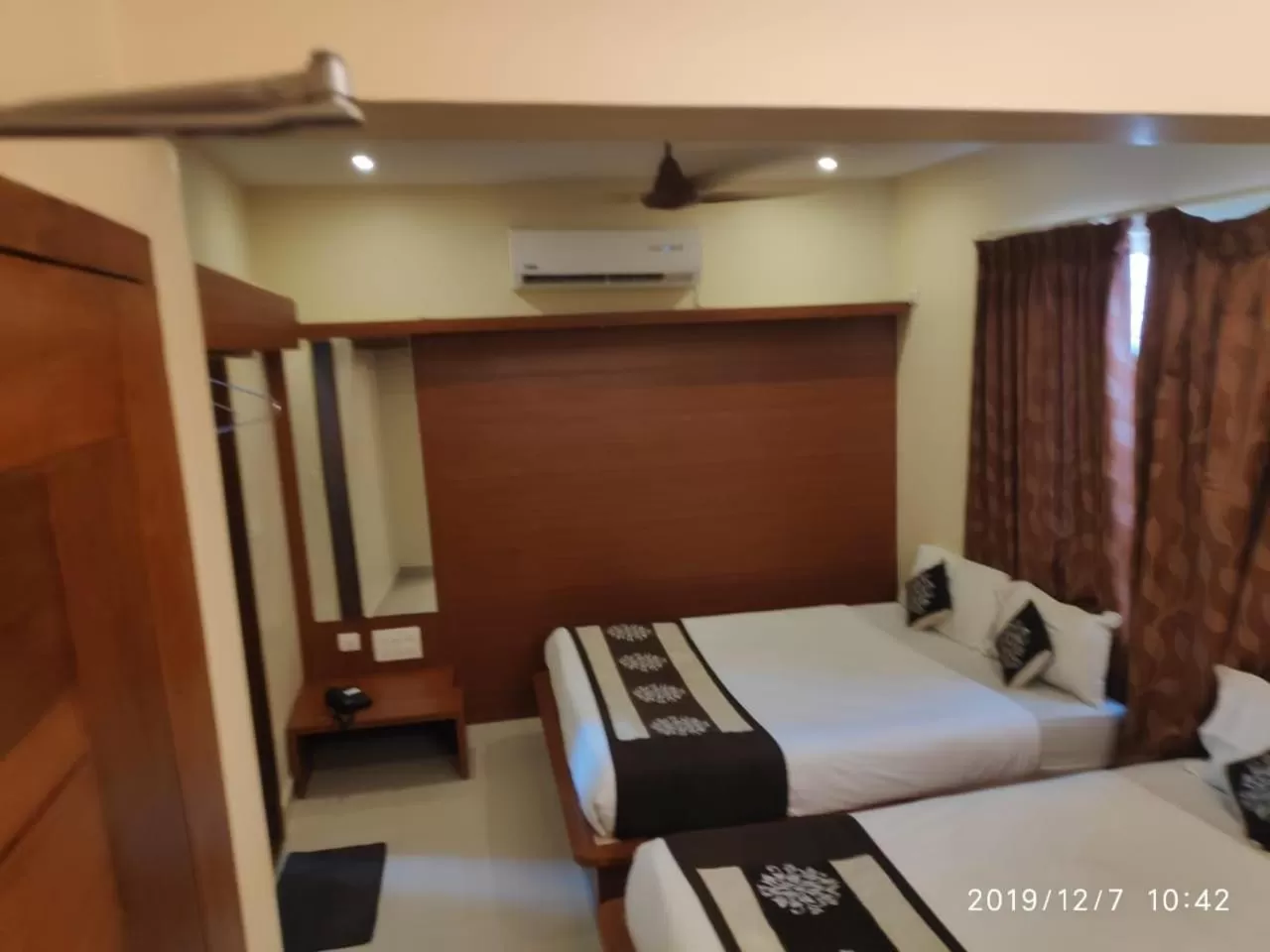 Bedroom, Bed in The Grand Inn Mysore