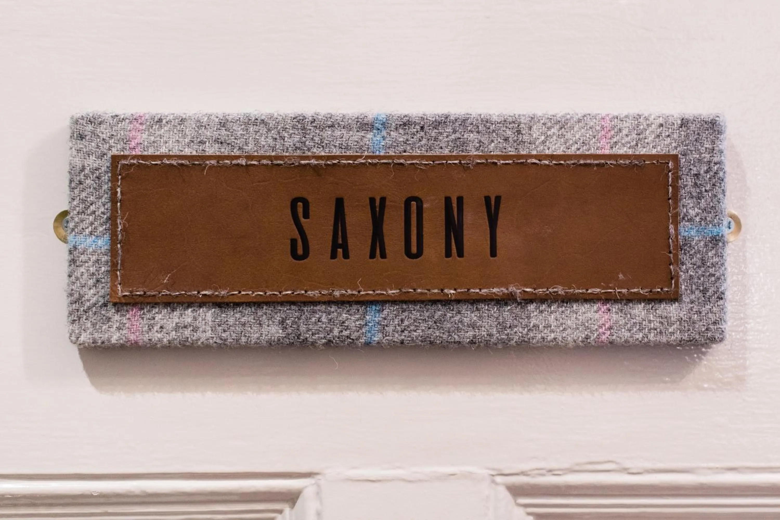 Logo/Certificate/Sign in Tweedies Bar and Lodge