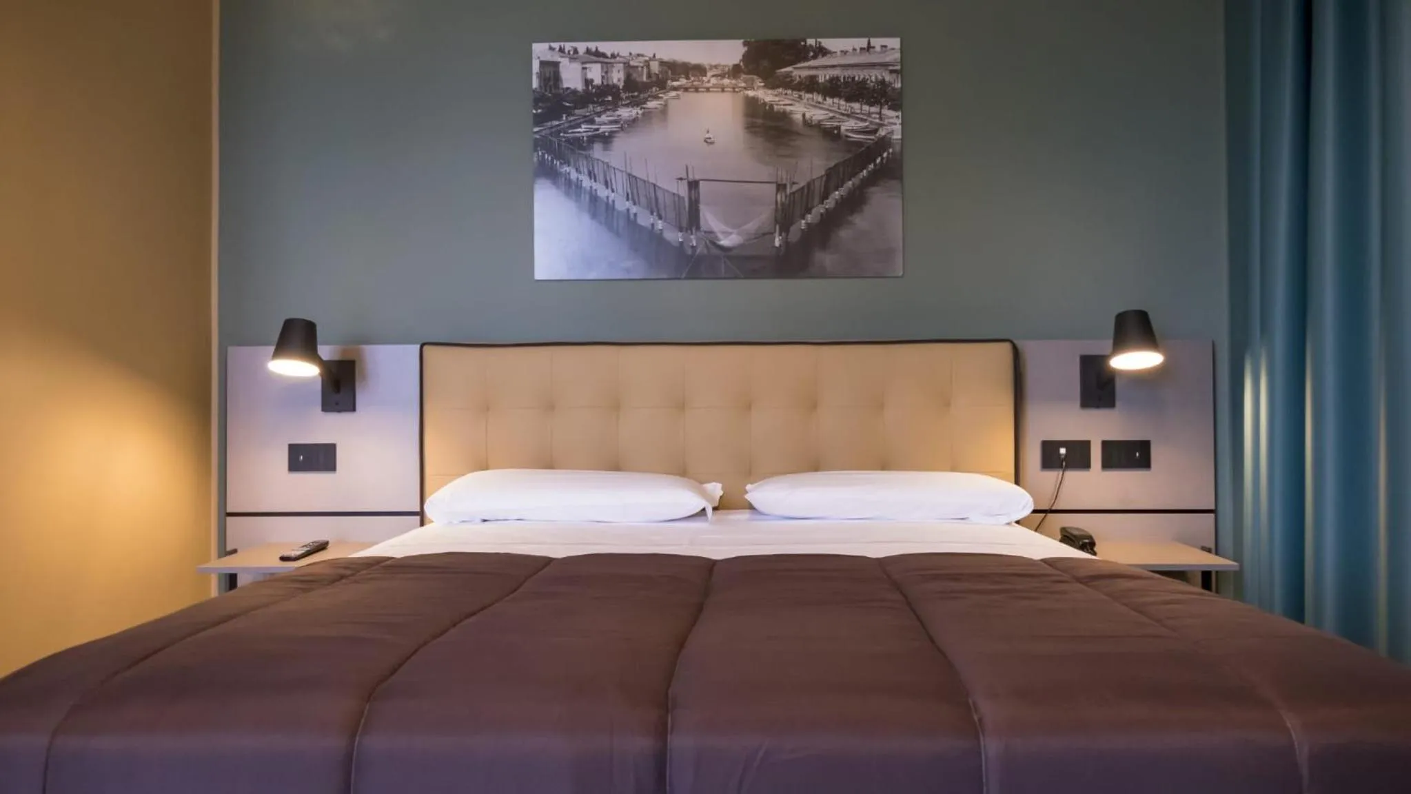 Bed in Hotel Puccini