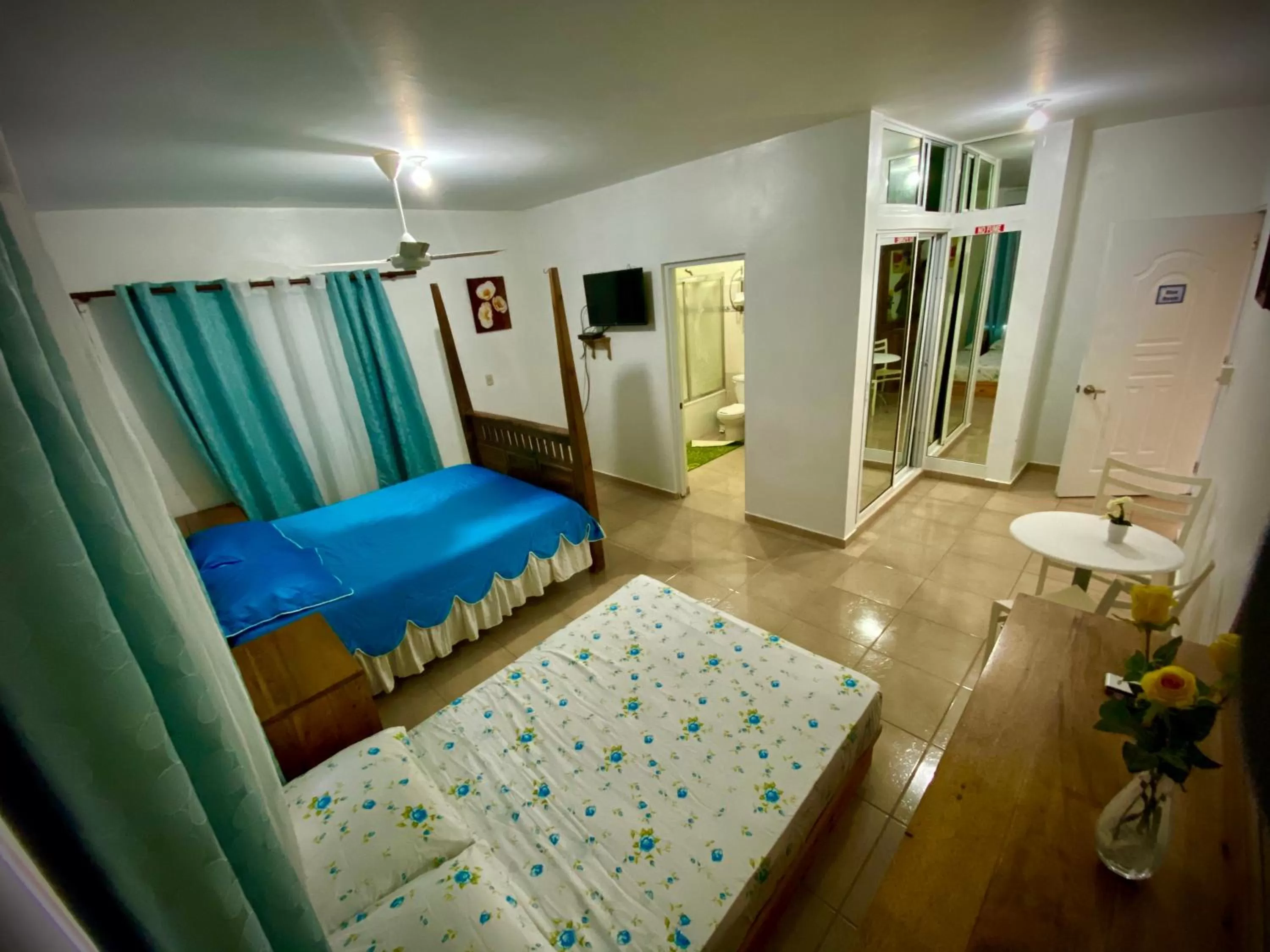 Bed in El Malecon B&B Hotel