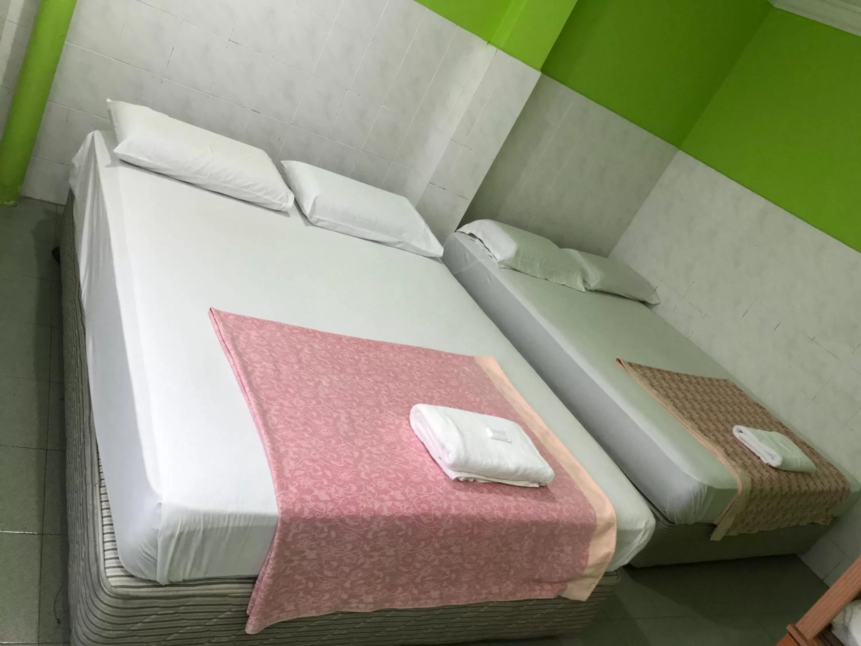 Bed in Hotel Cahaya