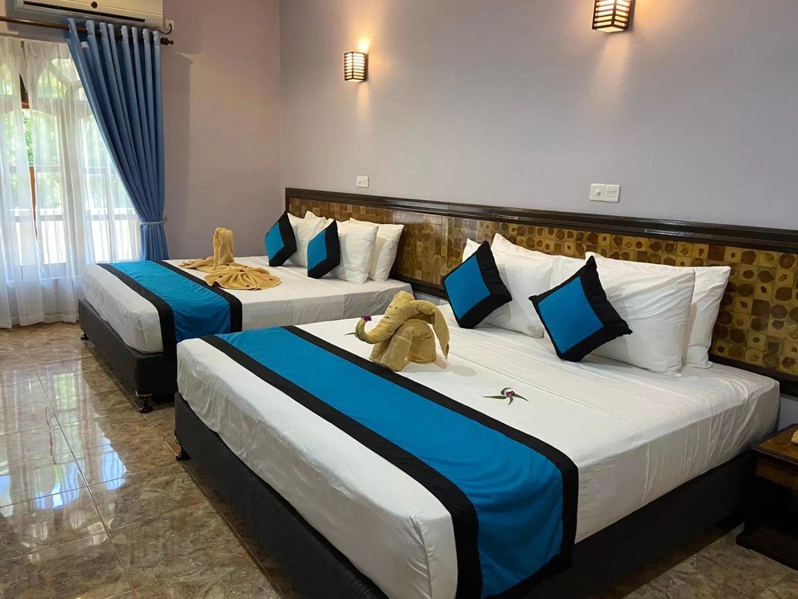 Bed in Blue Sand Beach Resort