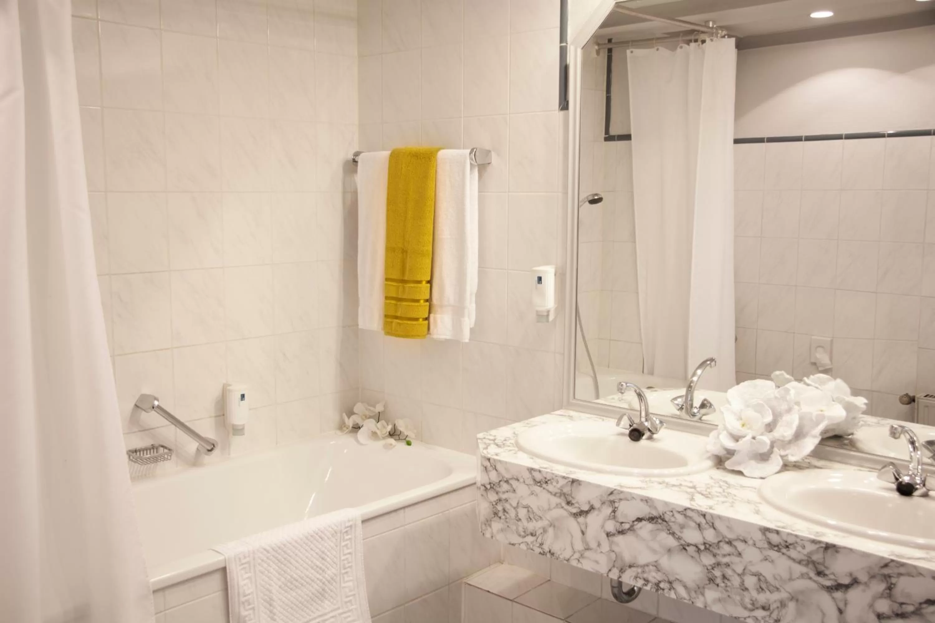 Bathroom in INA Hotel Royal