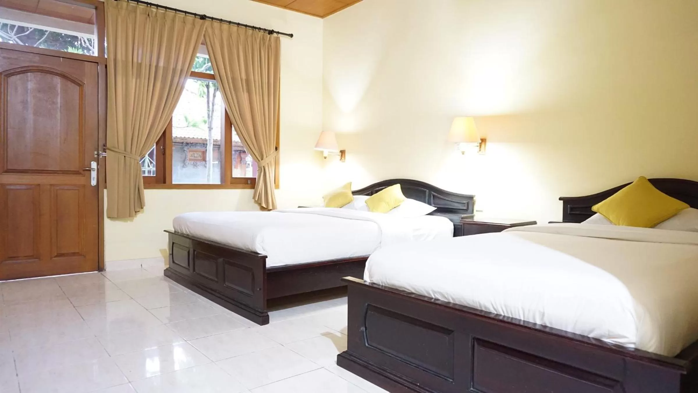 Bed in Masainn Hotel Kuta