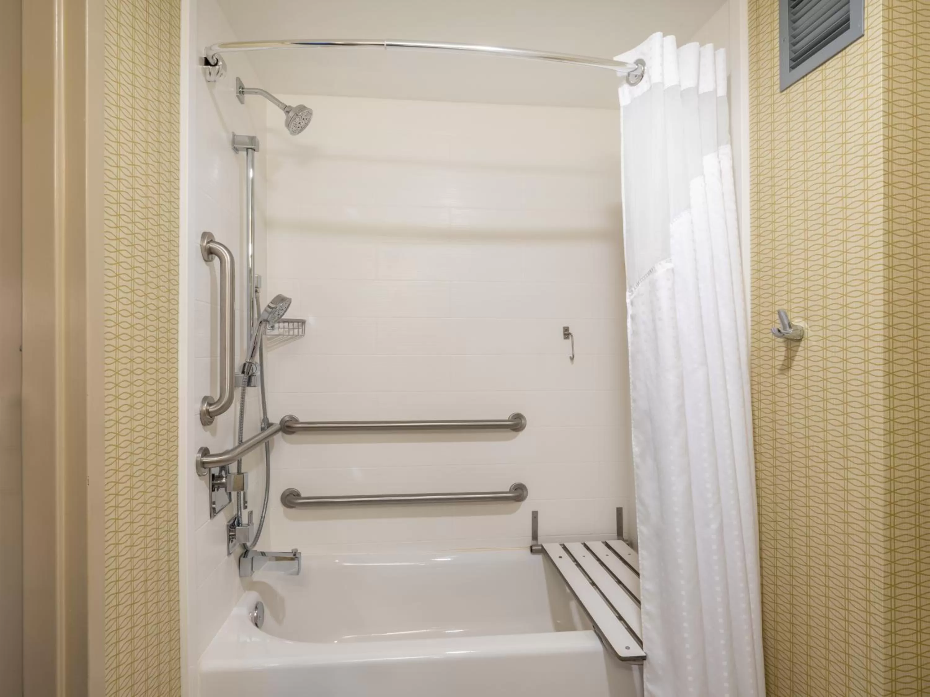 Bathroom in Holiday Inn Greensboro Coliseum by IHG