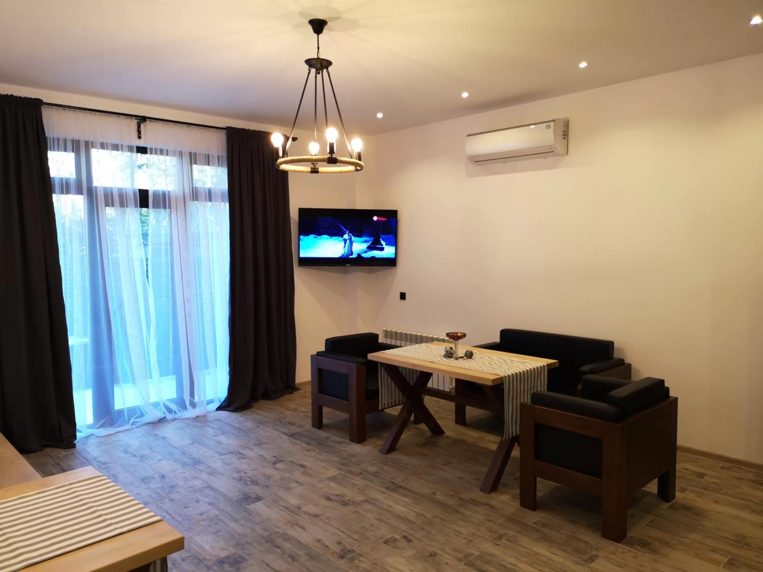 TV and multimedia, TV/Entertainment Center in Level Up Hotel & Restaurant
