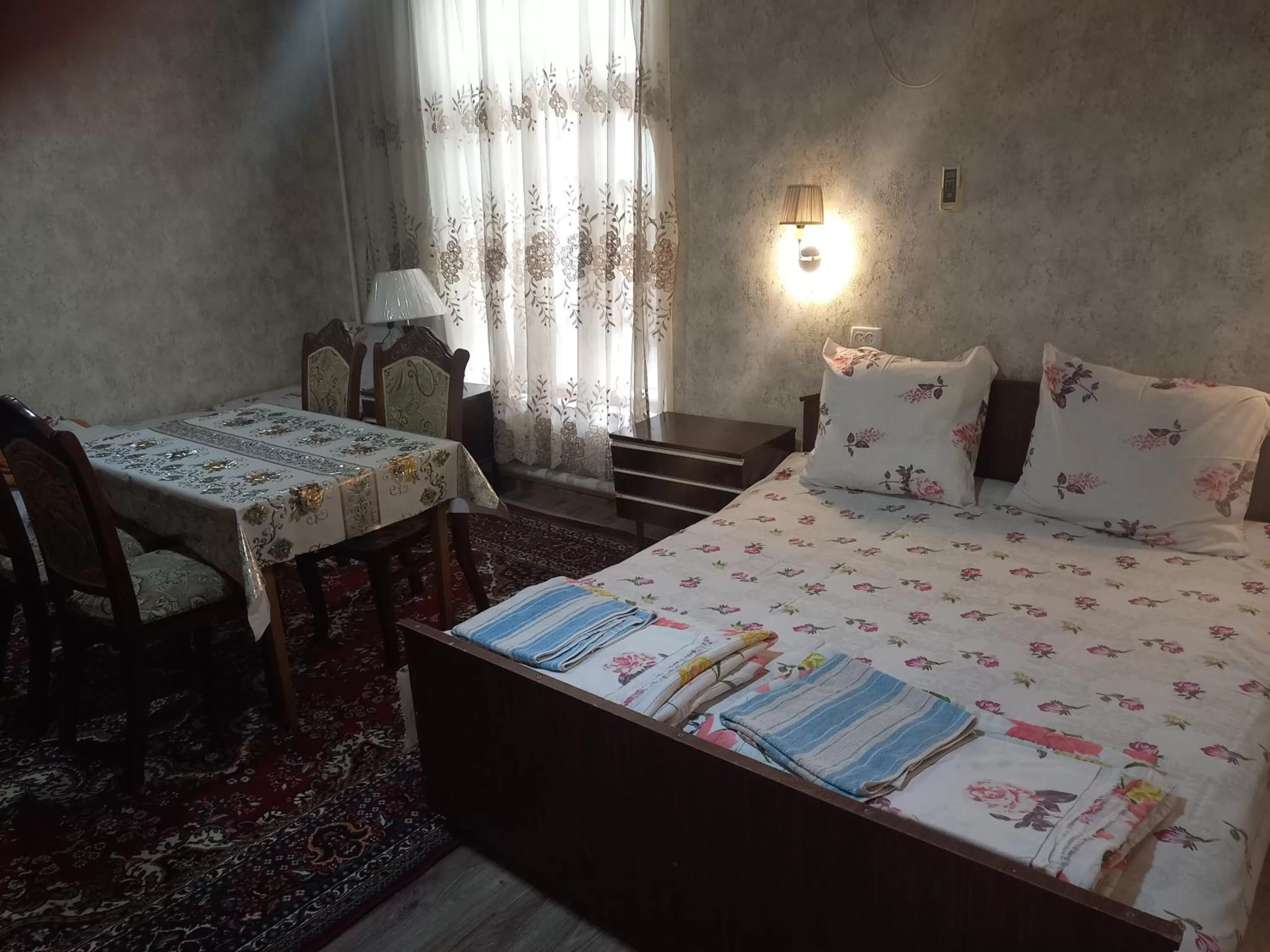 Bed in B&B Bahodir