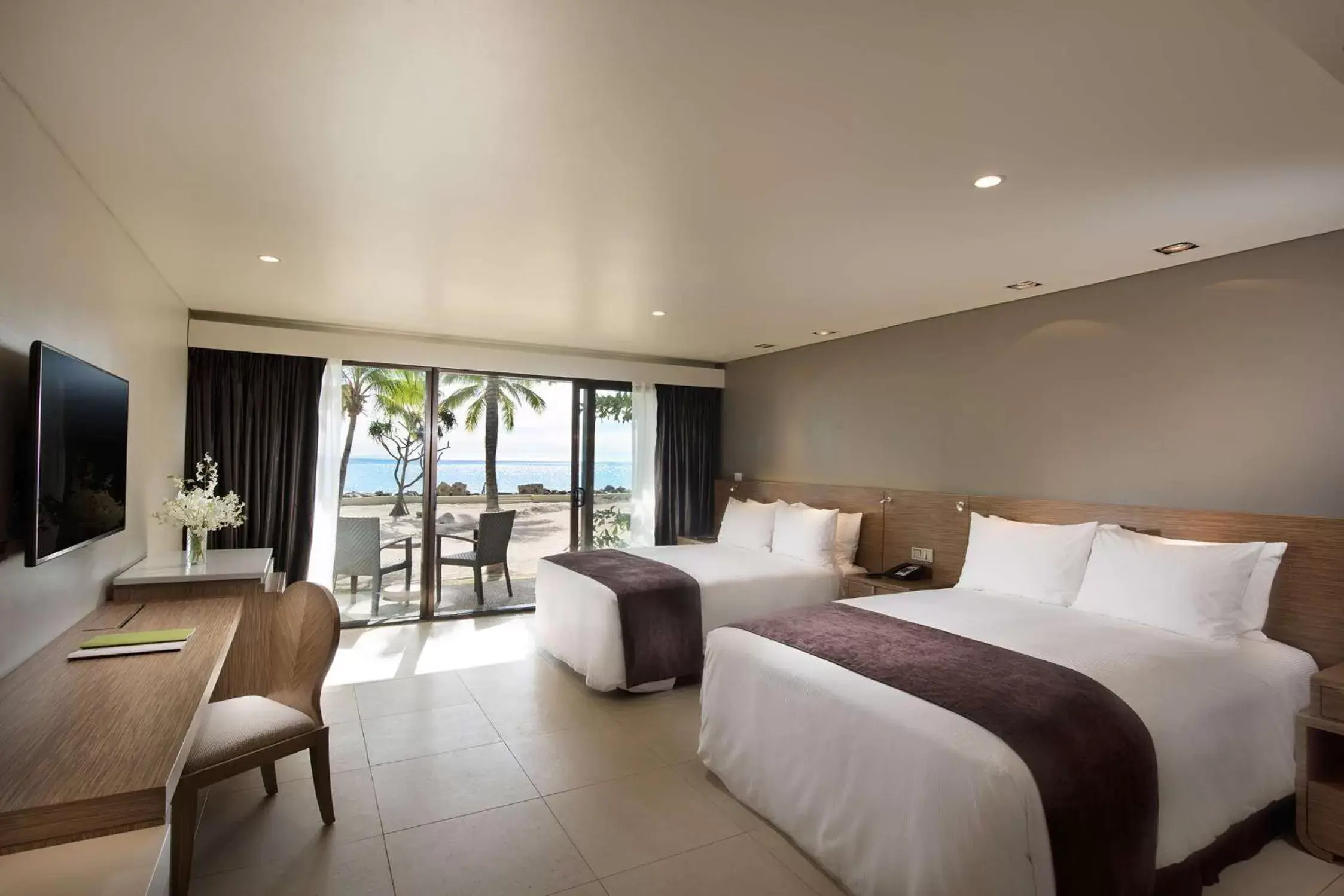 Double Queen Guest Room Beachfront with Balcony in DoubleTree by Hilton Fiji - Sonaisali Island Double Queen Guest Room Beachfront with Balcony in DoubleTree by Hilton Fiji - Sonaisali Island