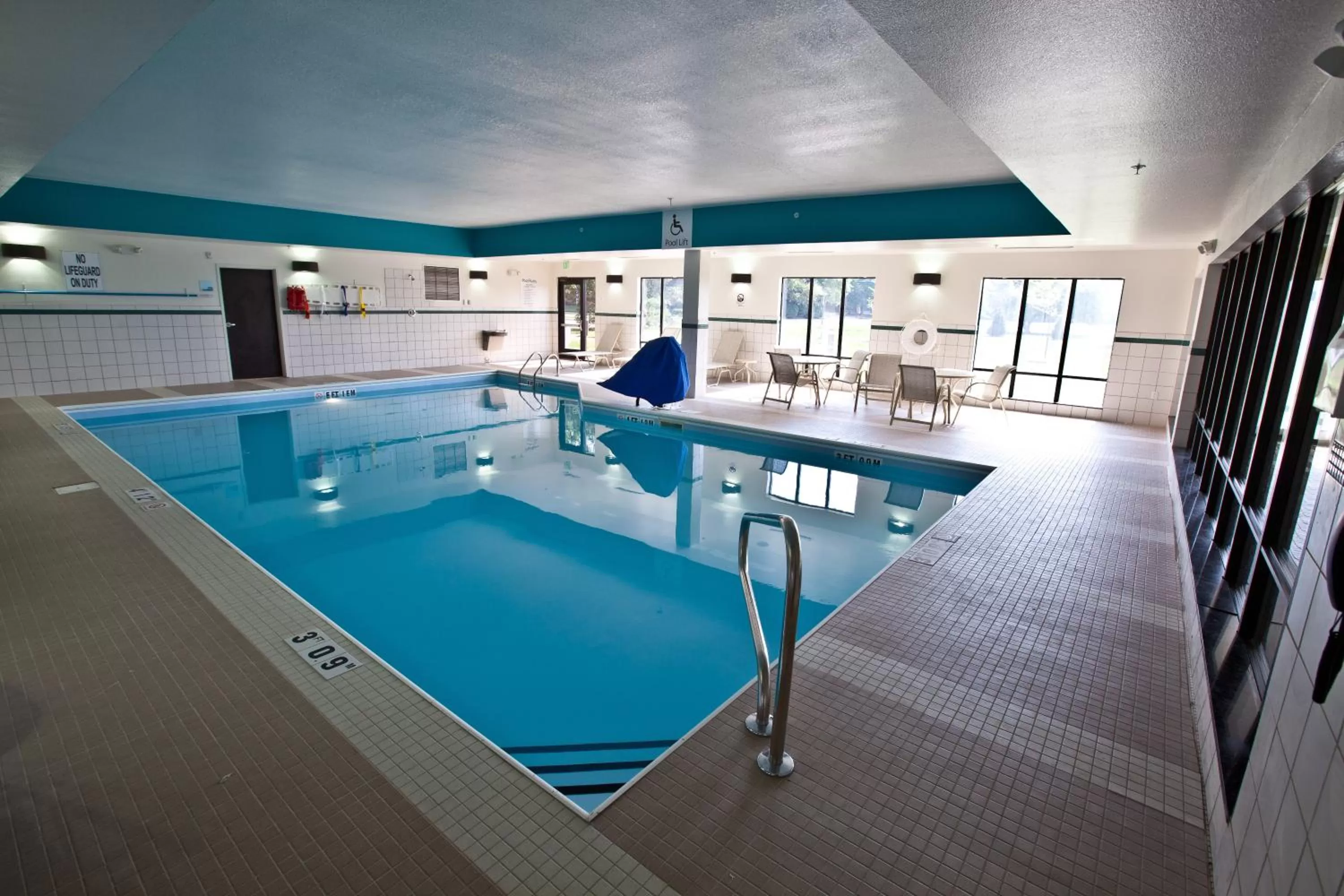 Swimming pool in Holiday Inn Express and Suites Detroit North-Troy by IHG