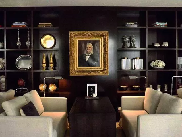 Communal lounge/ TV room in Universal Boutique Hotel