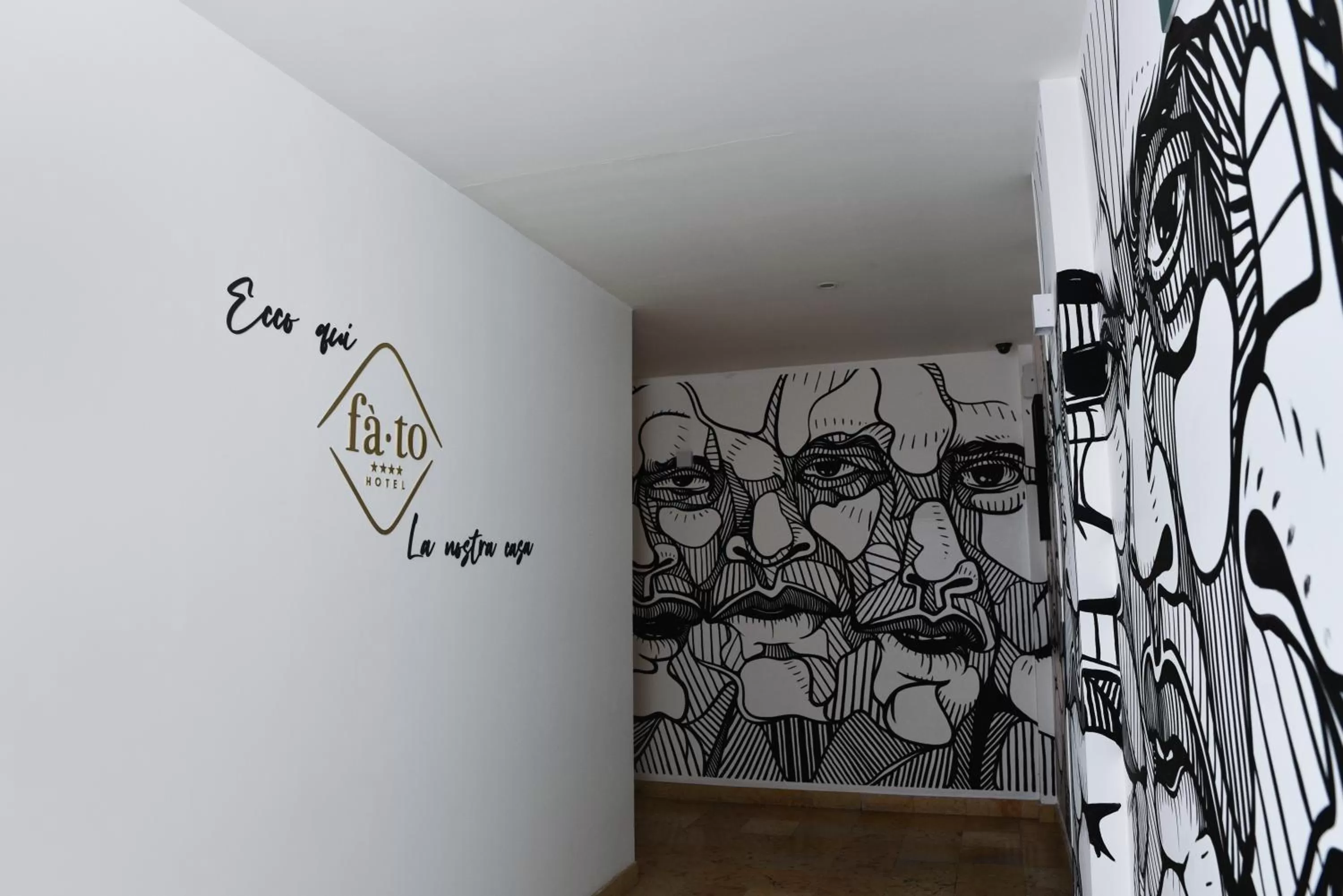 Property logo or sign in Fato Hotel