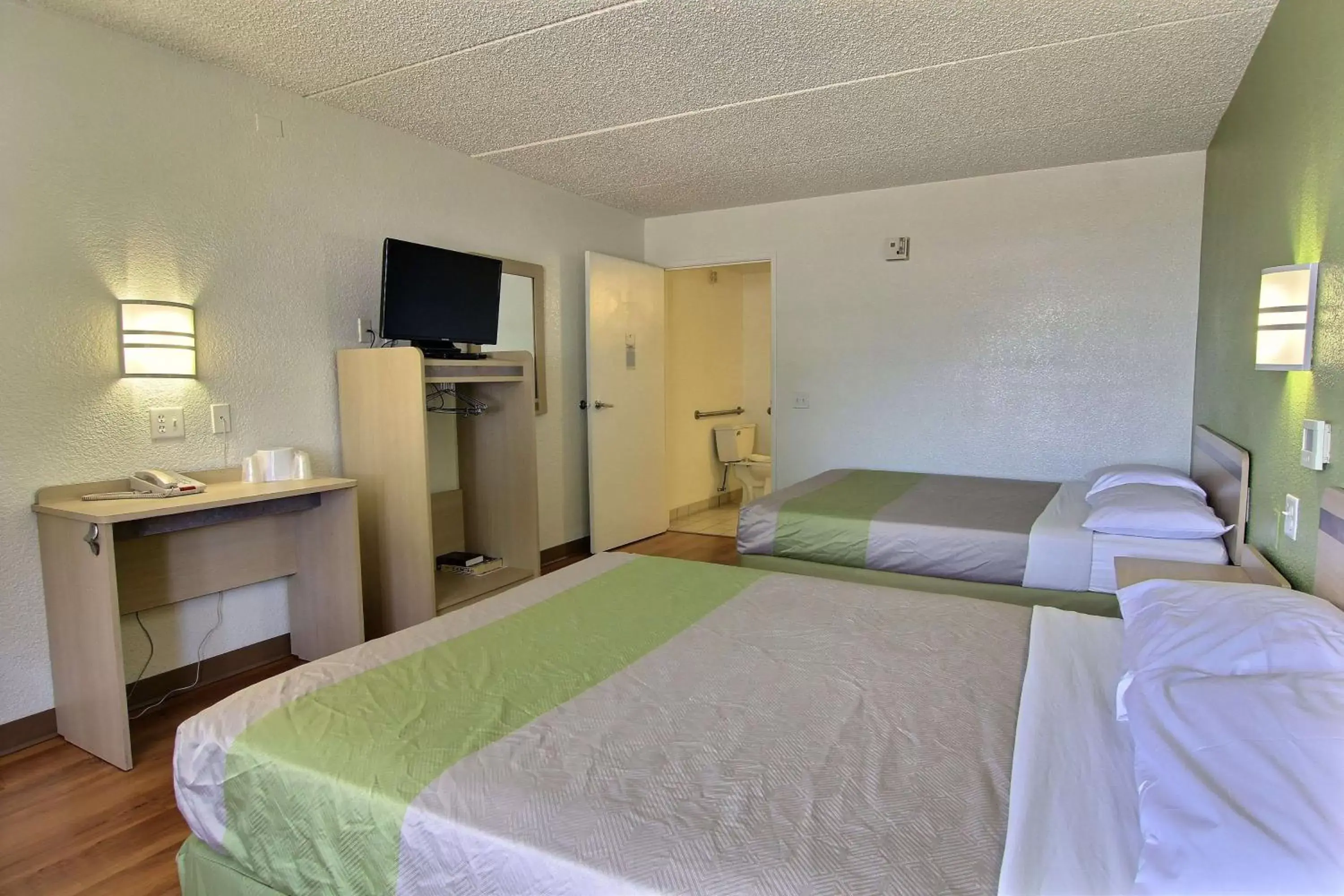 Deluxe Queen Room with Two Queen Beds - single occupancy in Motel 6 Austin, TX - Central Downtown UT Deluxe Queen Room with Two Queen Beds - single occupancy in Motel 6 Austin, TX - Central Downtown UT