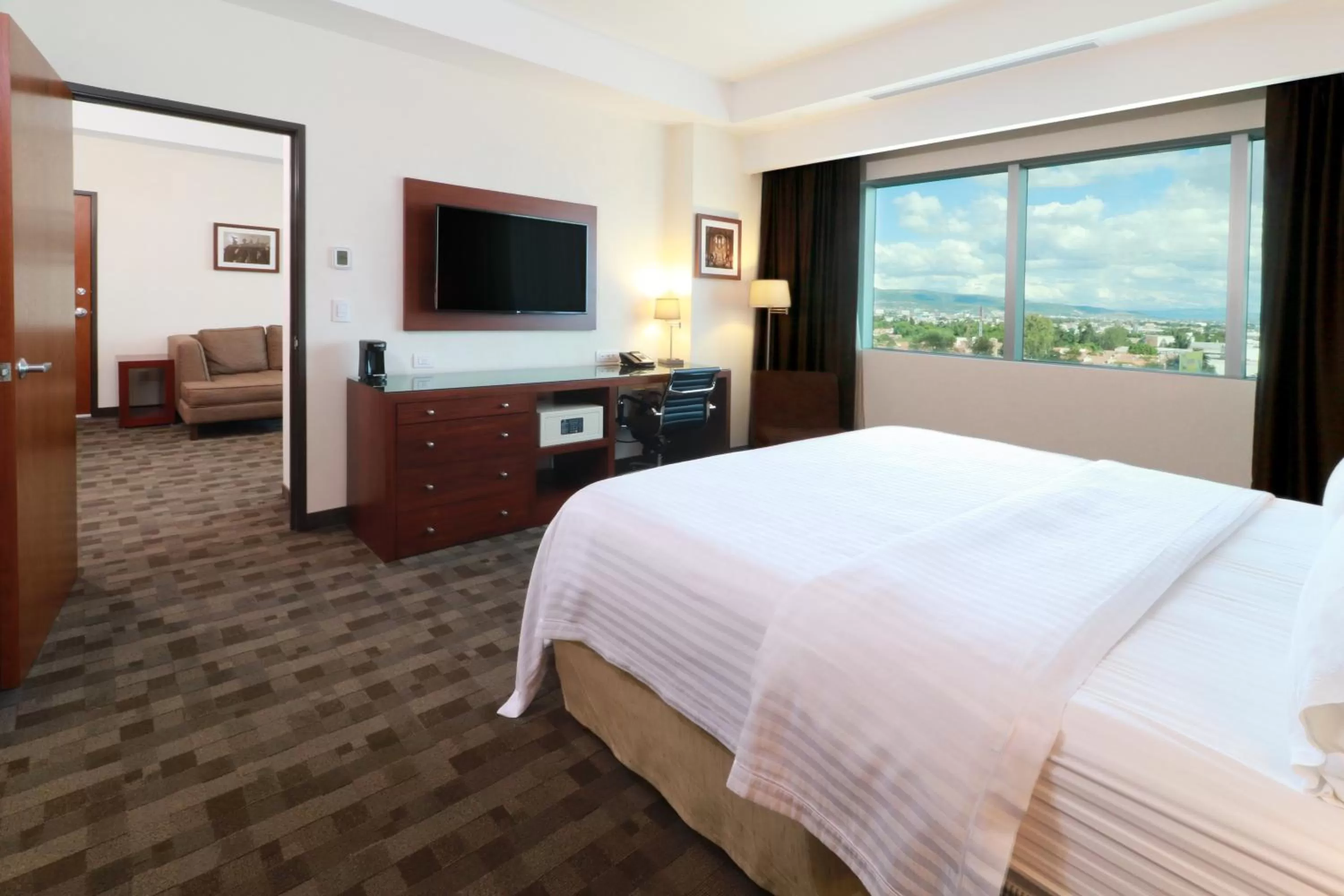 Photo of the whole room, Bed in Holiday Inn & Suites Plaza Mayor by IHG