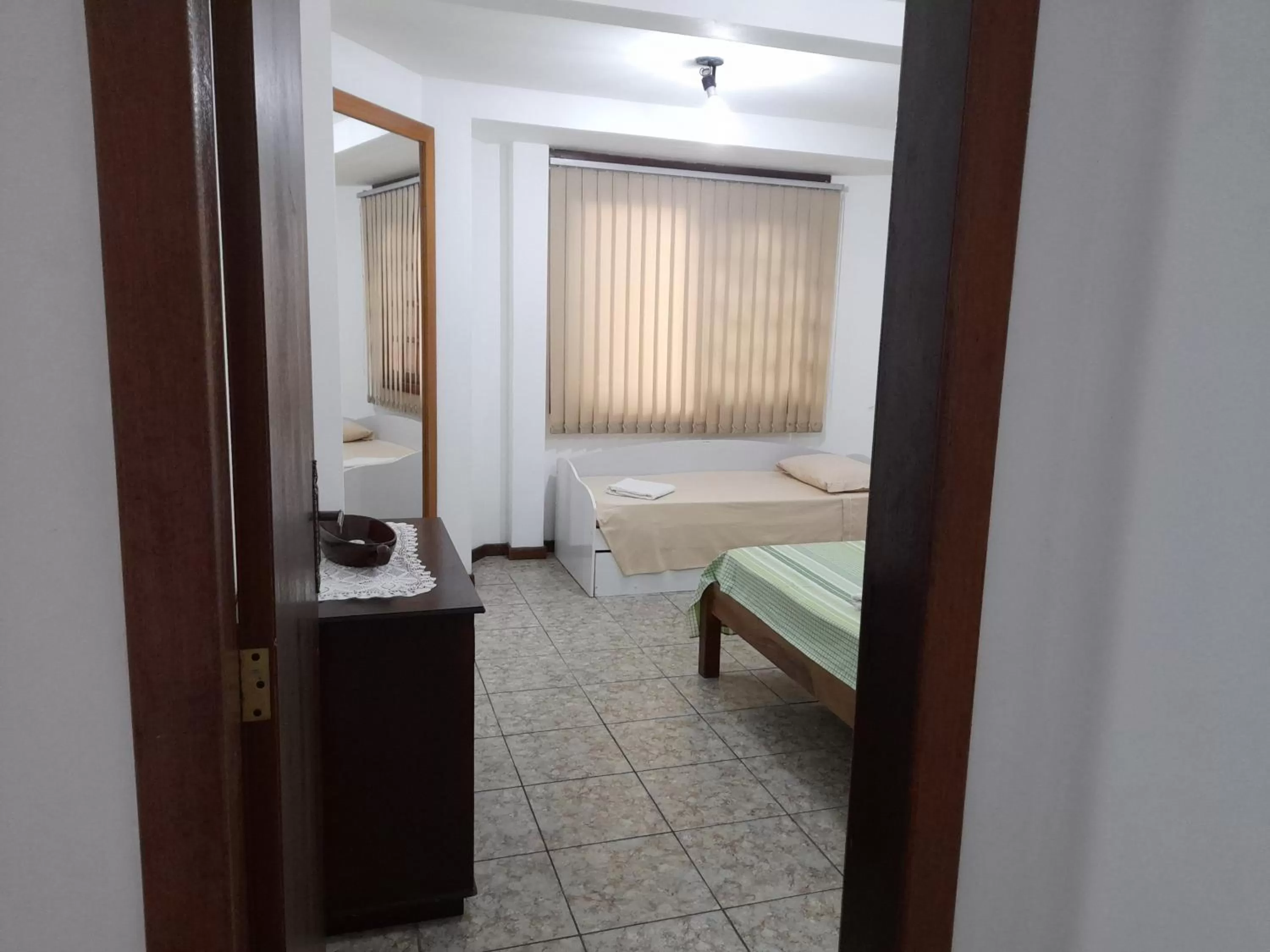 Bed in Pousada Baleia Franca Canasvieiras