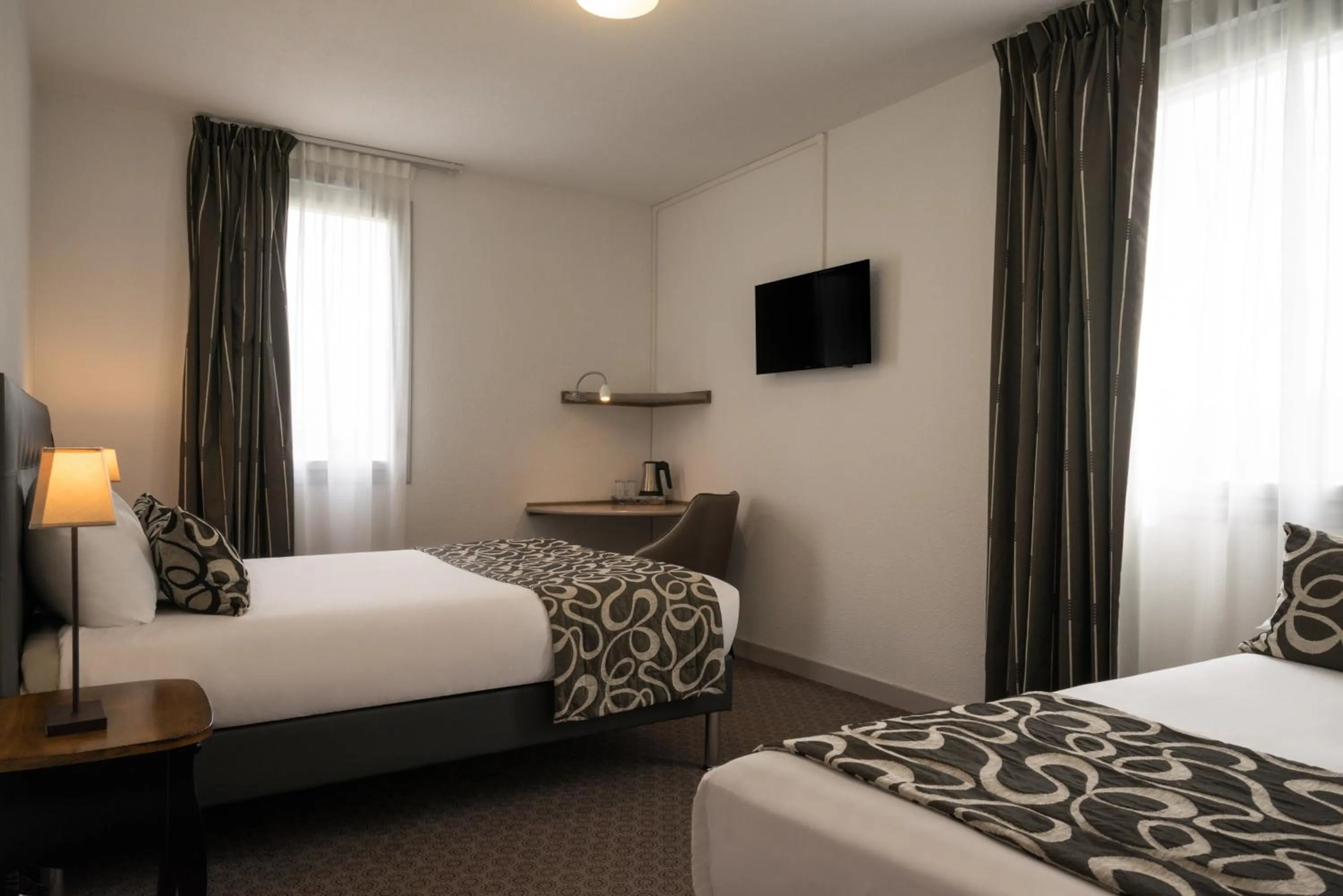 Photo of the whole room, Bed in Hôtel du Moulin