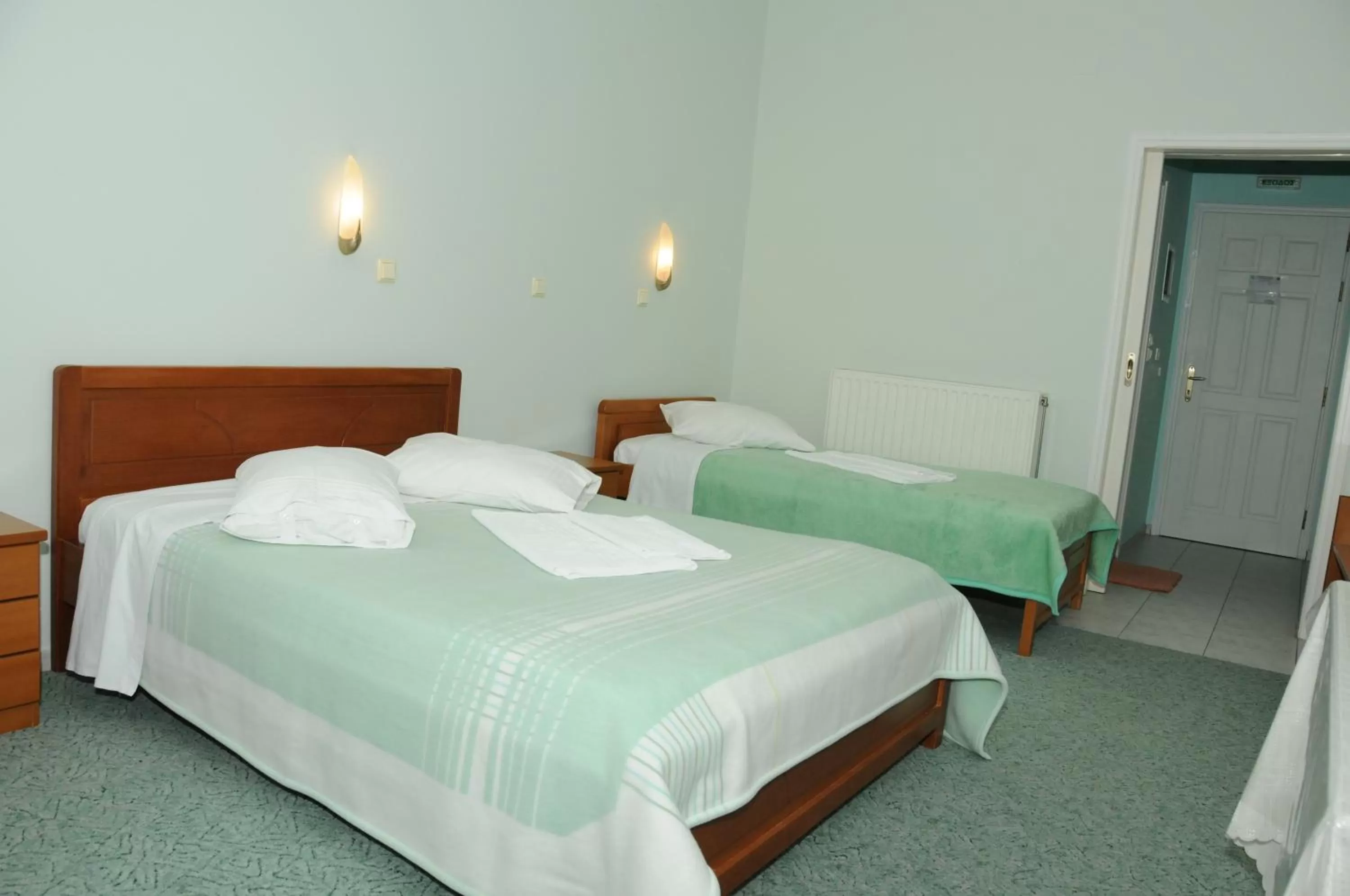 Bedroom in Costa-Rini Hotel