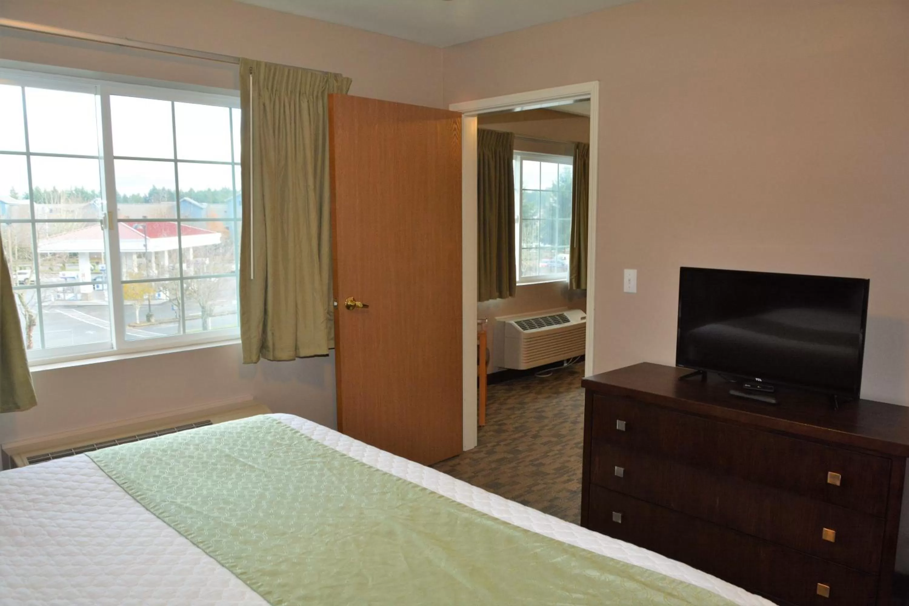 Bed in FairBridge Inn & Suites DuPont