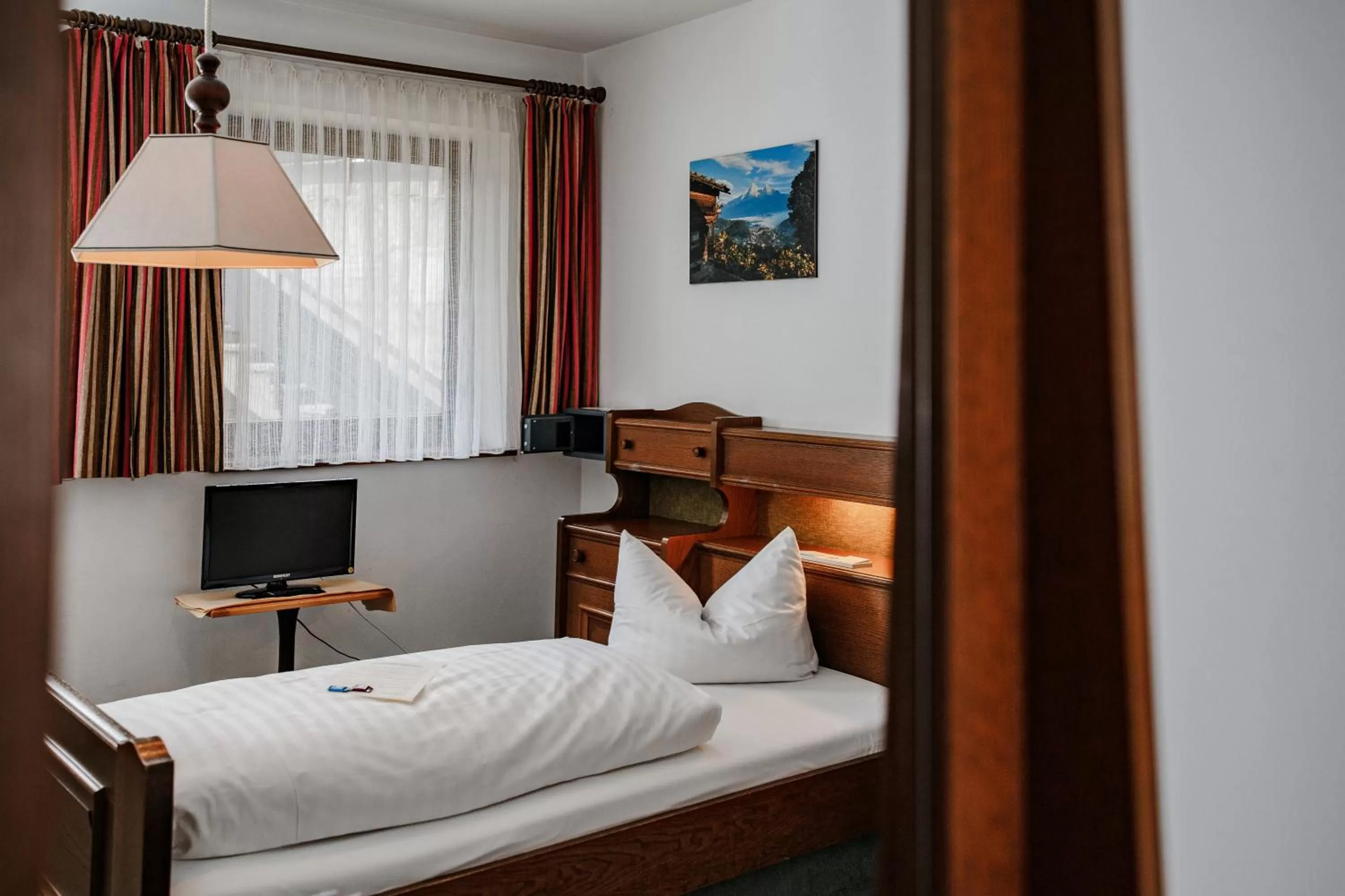 Bed in Hotel Vier Jahreszeiten