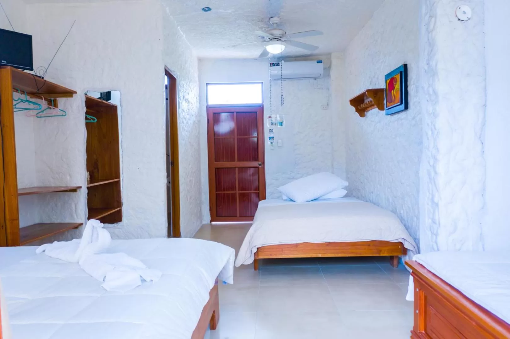 Bed in Royal Galápagos Inn