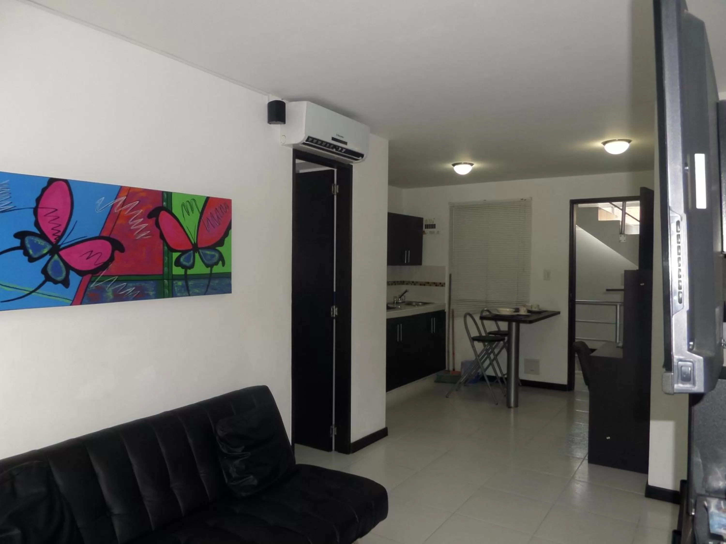 Living room in Apartasuites San Marcos