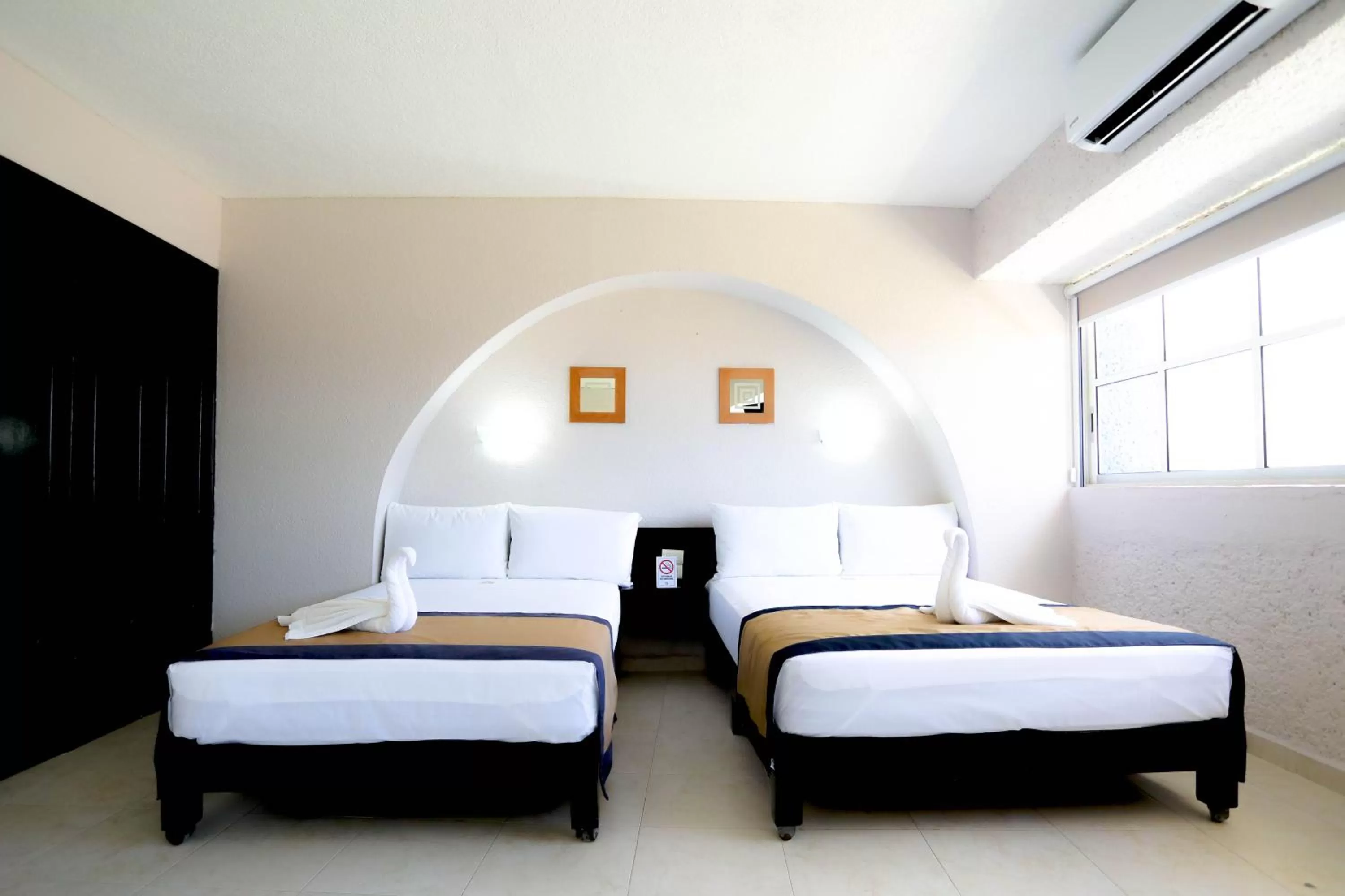 Bed in Hotel Caribe Internacional Cancun