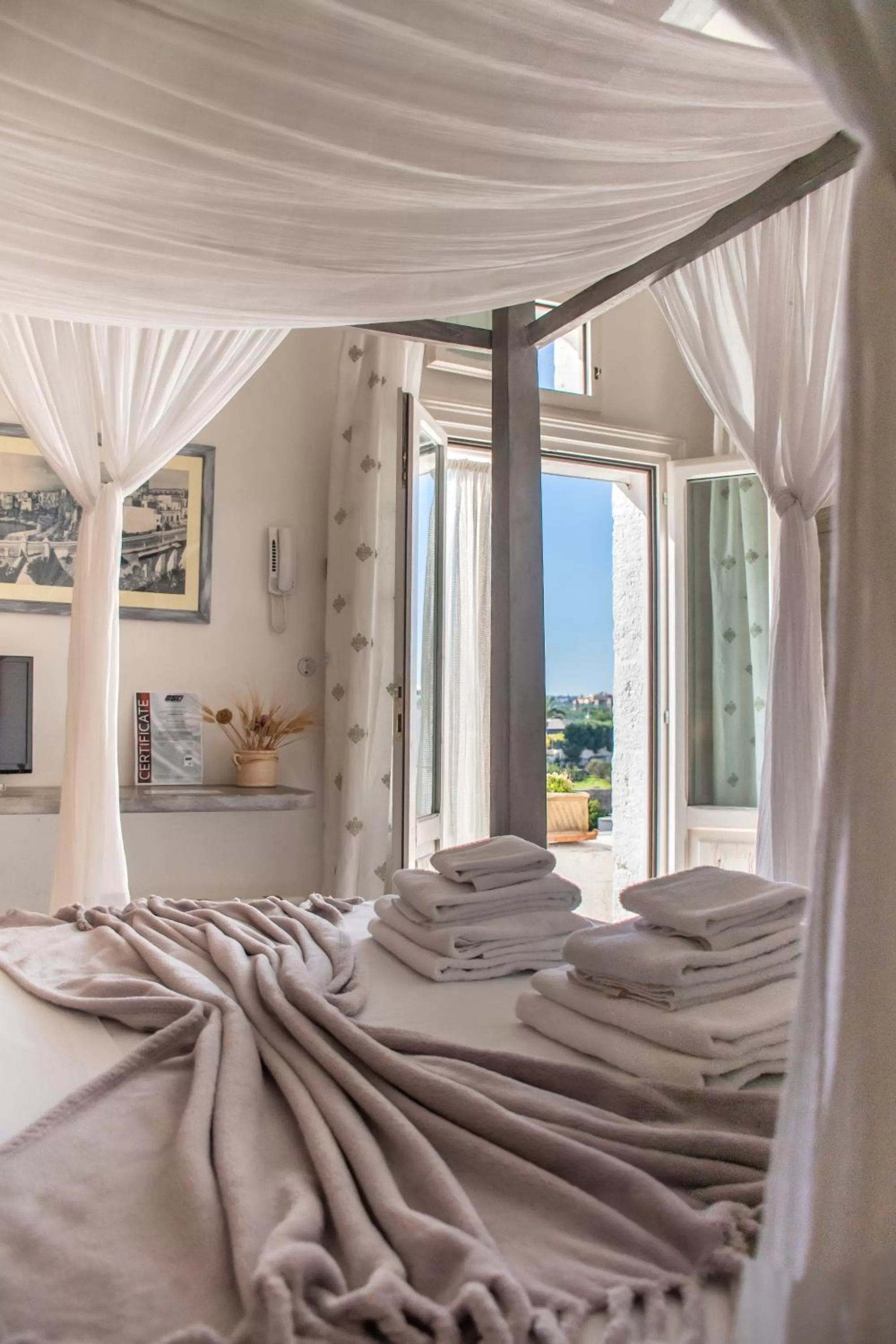 Bed in Antico Mondo Rooms & Suites