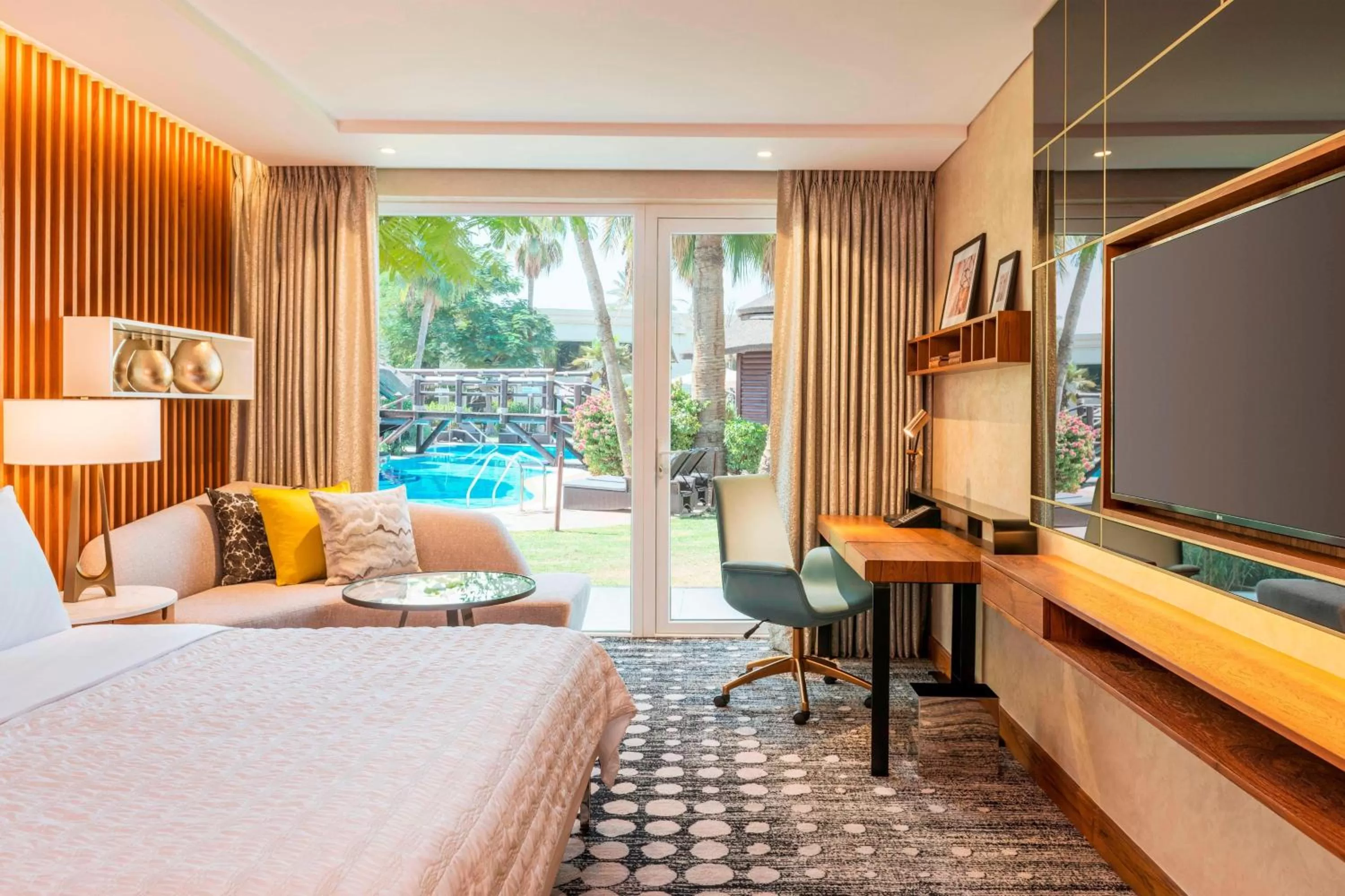 Swimming pool, Bed in Le Méridien Dubai Hotel & Conference Centre