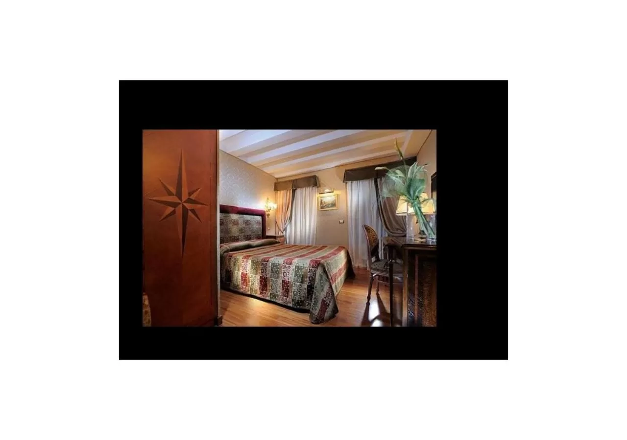 Bed in Hotel Ca' Marinella