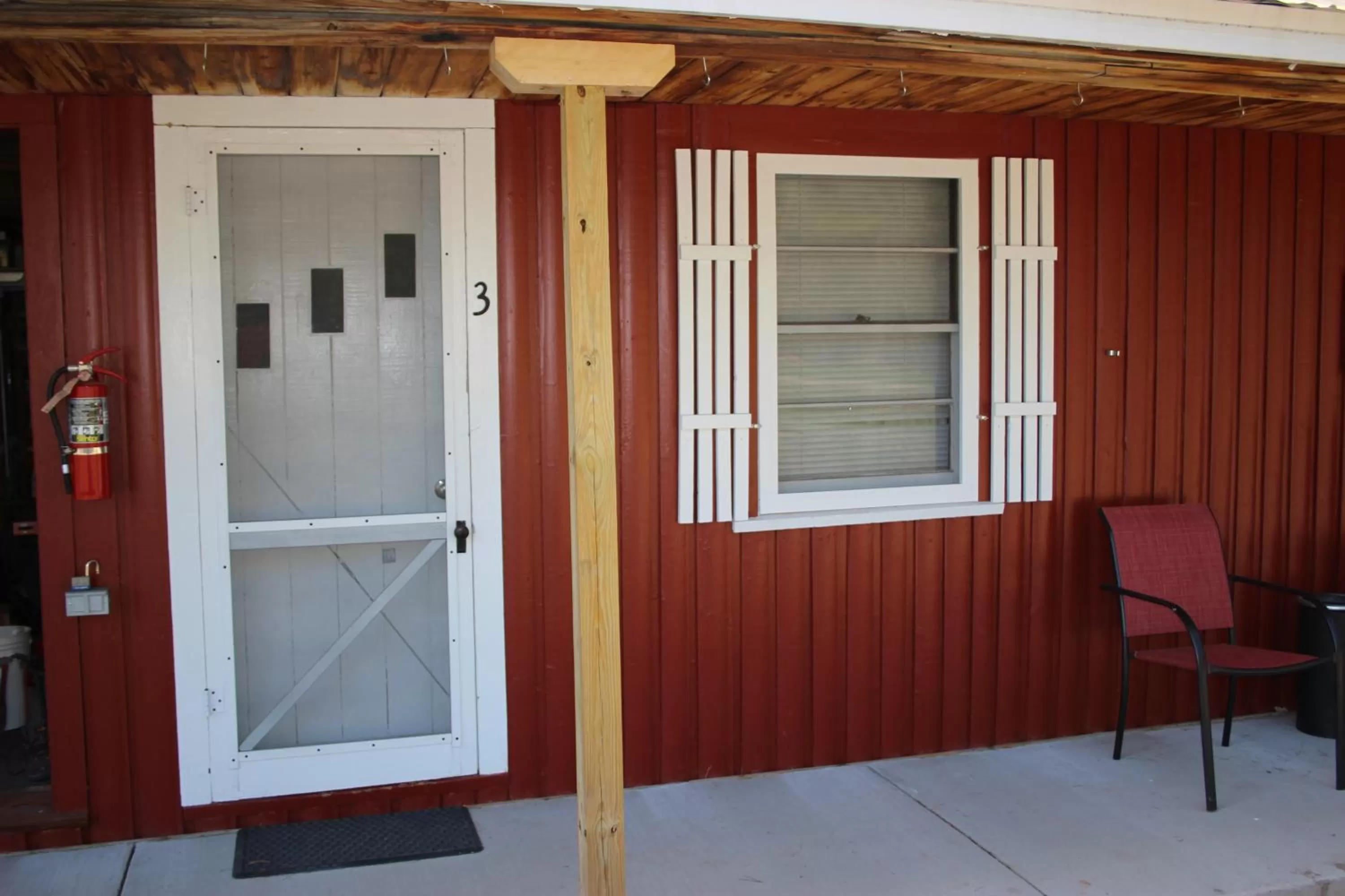 Facade/entrance in Two Rivers Motel and Cabins of Kenton, MI