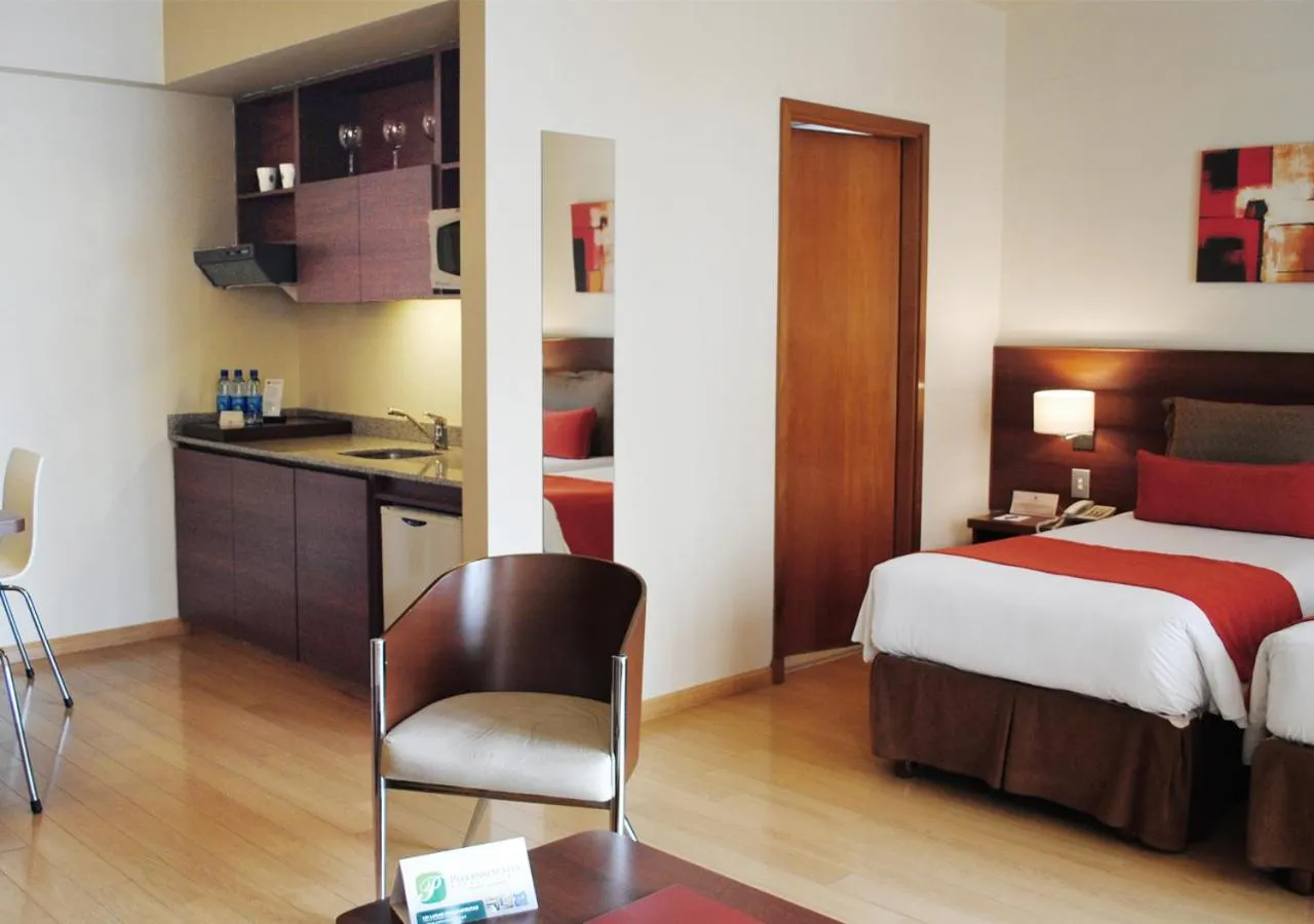 Kitchen or kitchenette, Bed in Palermo Suites Buenos Aires Hotel & Apartments