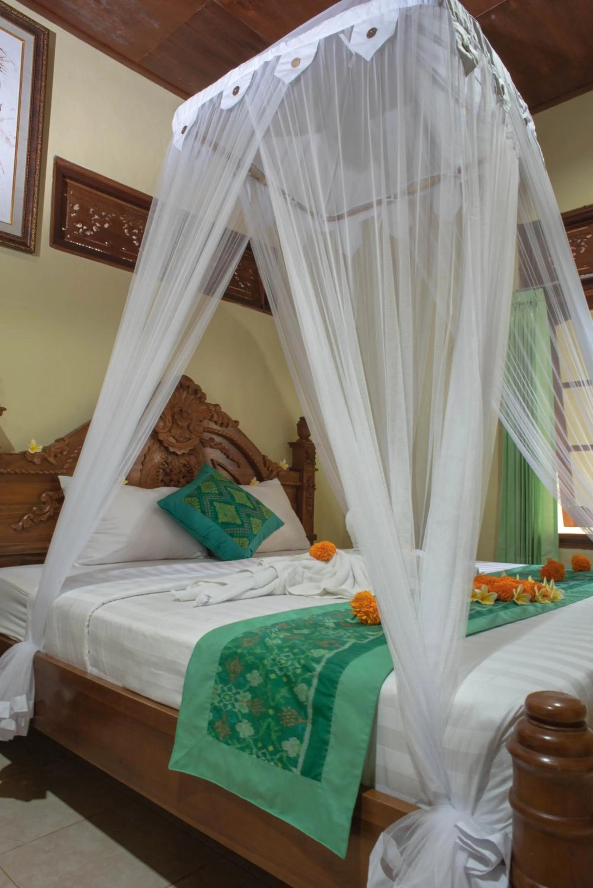 Bed in Suparsa's Homestay